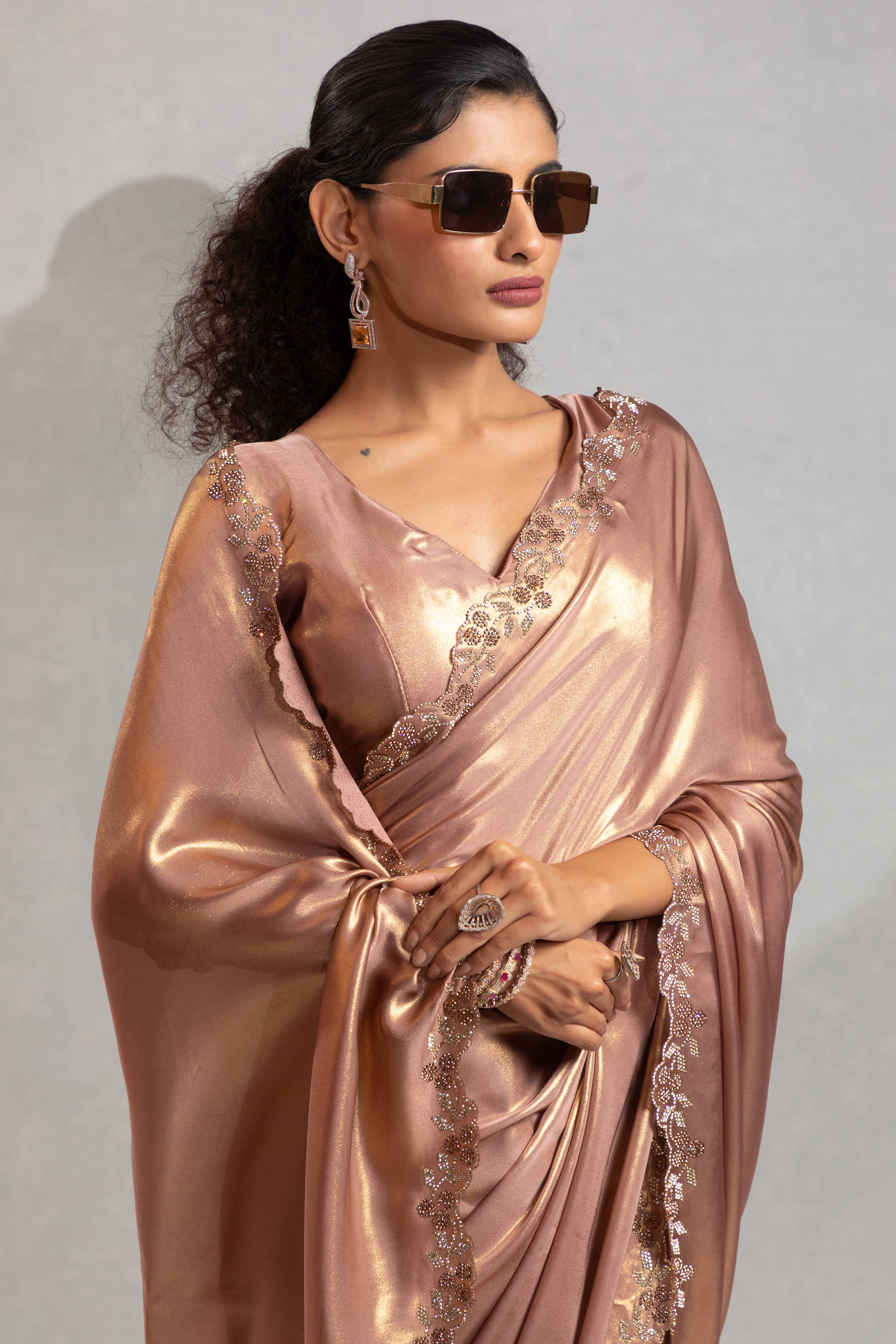 Zircon Brown Satin Georgette Saree Adorned With Subtle Foil Finish & A Sparkling Zarkan Work Border