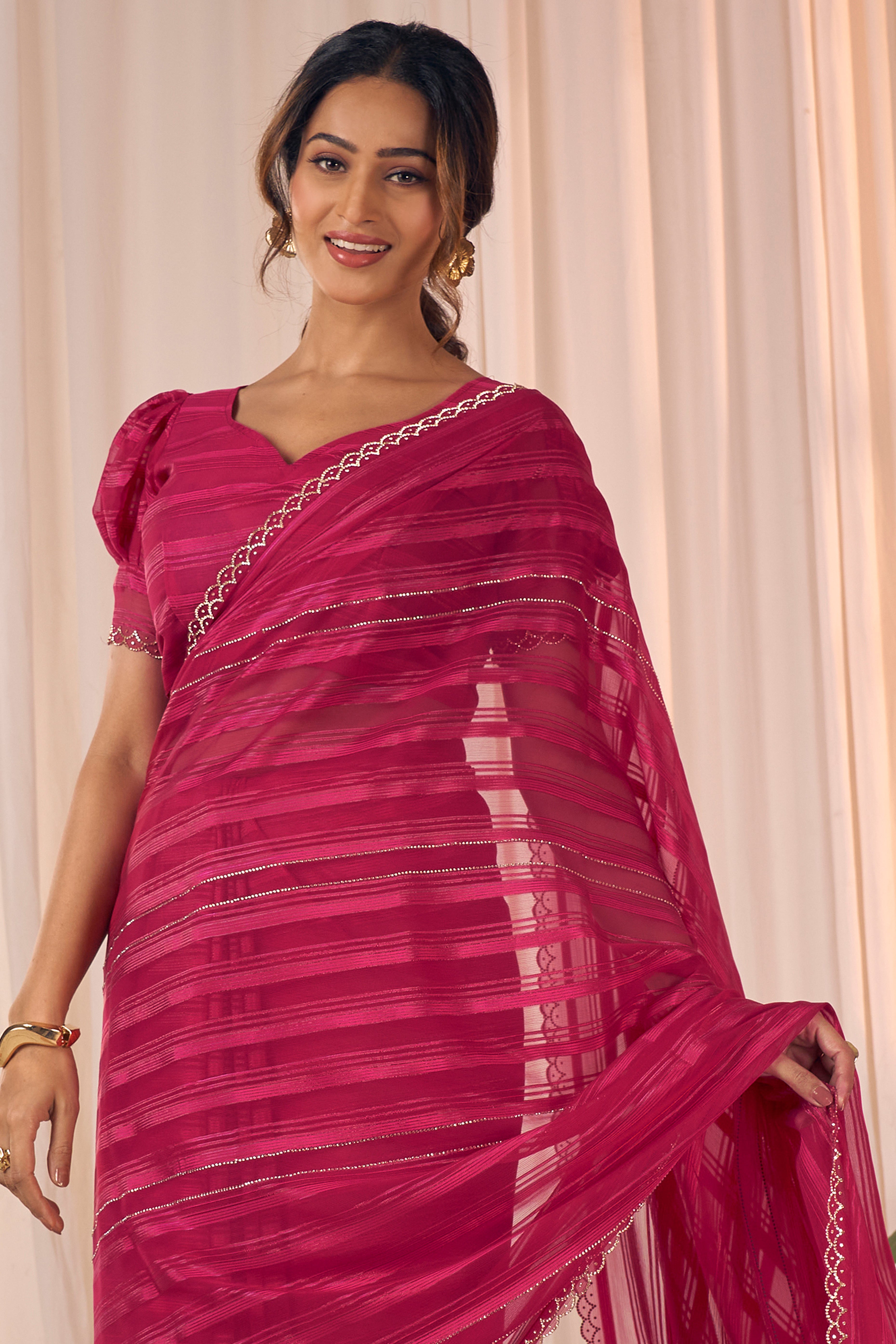 Rose pink Striped Designer Georgette Saree Adorned With An Elegant Zarkan Cutwork Border
