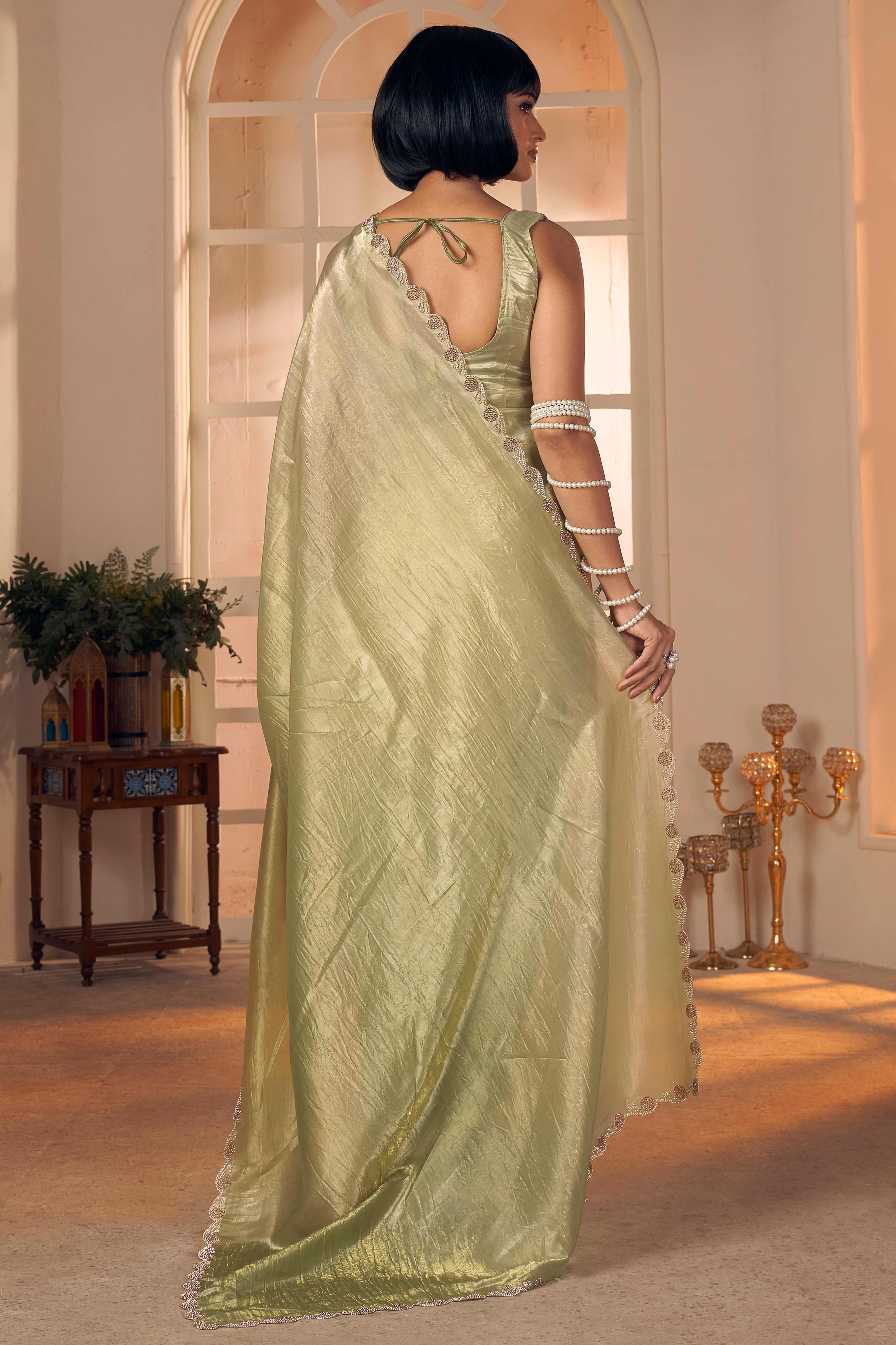 Elegant Olive Pure Silk Saree Enhanced With Premium Zarkan Cutwork Embellishment