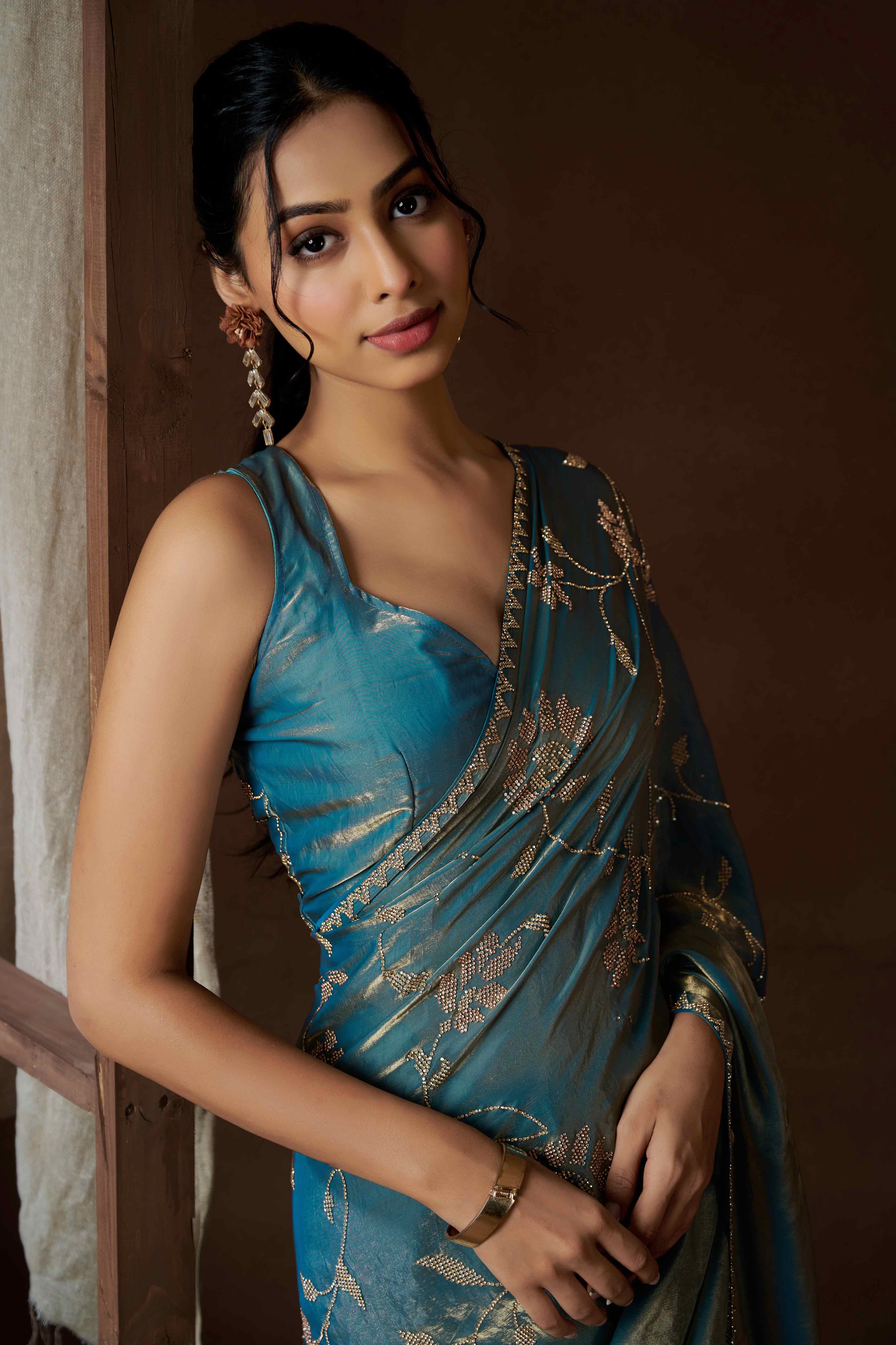 Sky Blue Satin Saree with Exquisite Stone Embellishments
