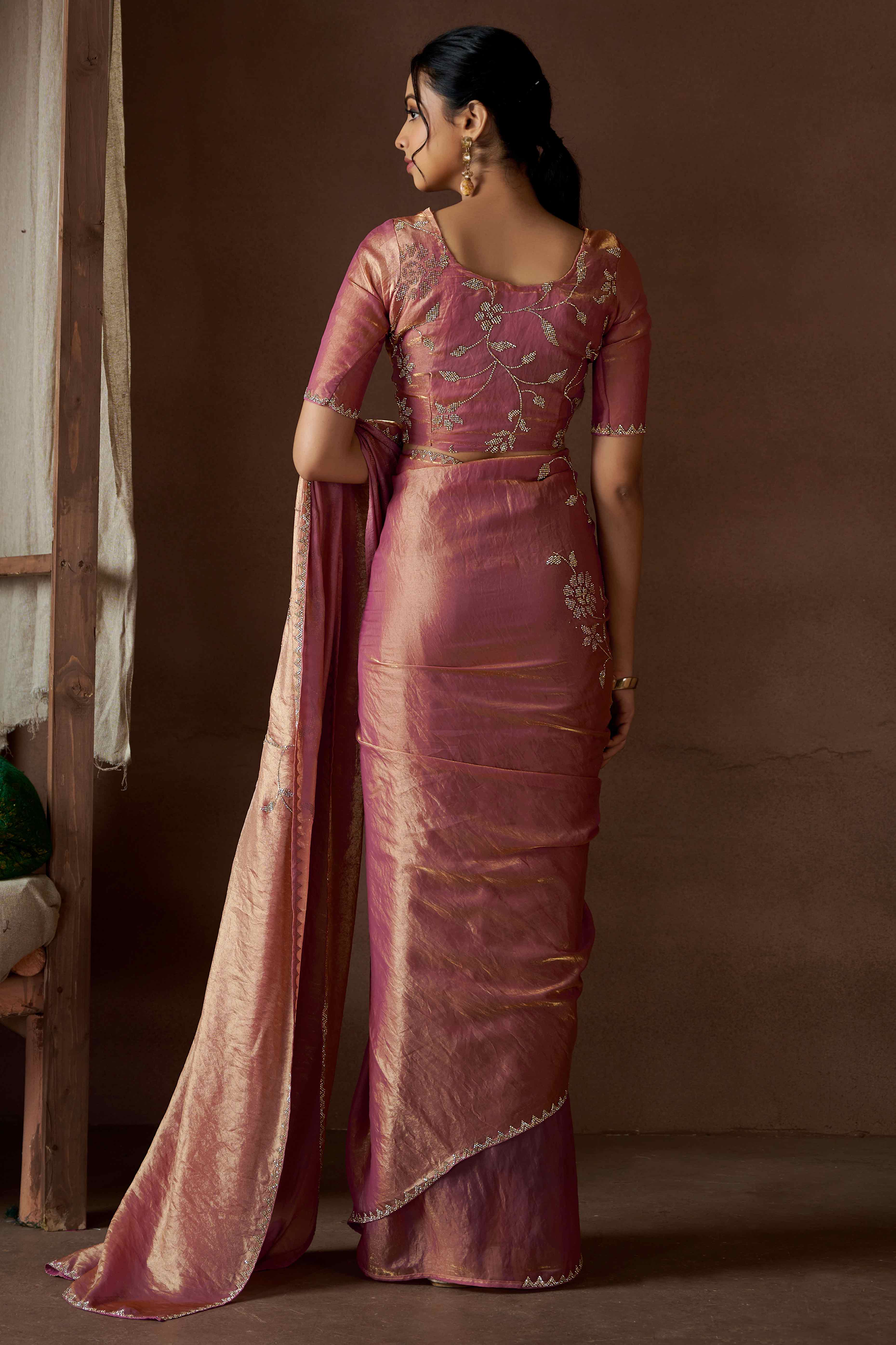 Peach Satin Saree with Exquisite Stone Embellishments