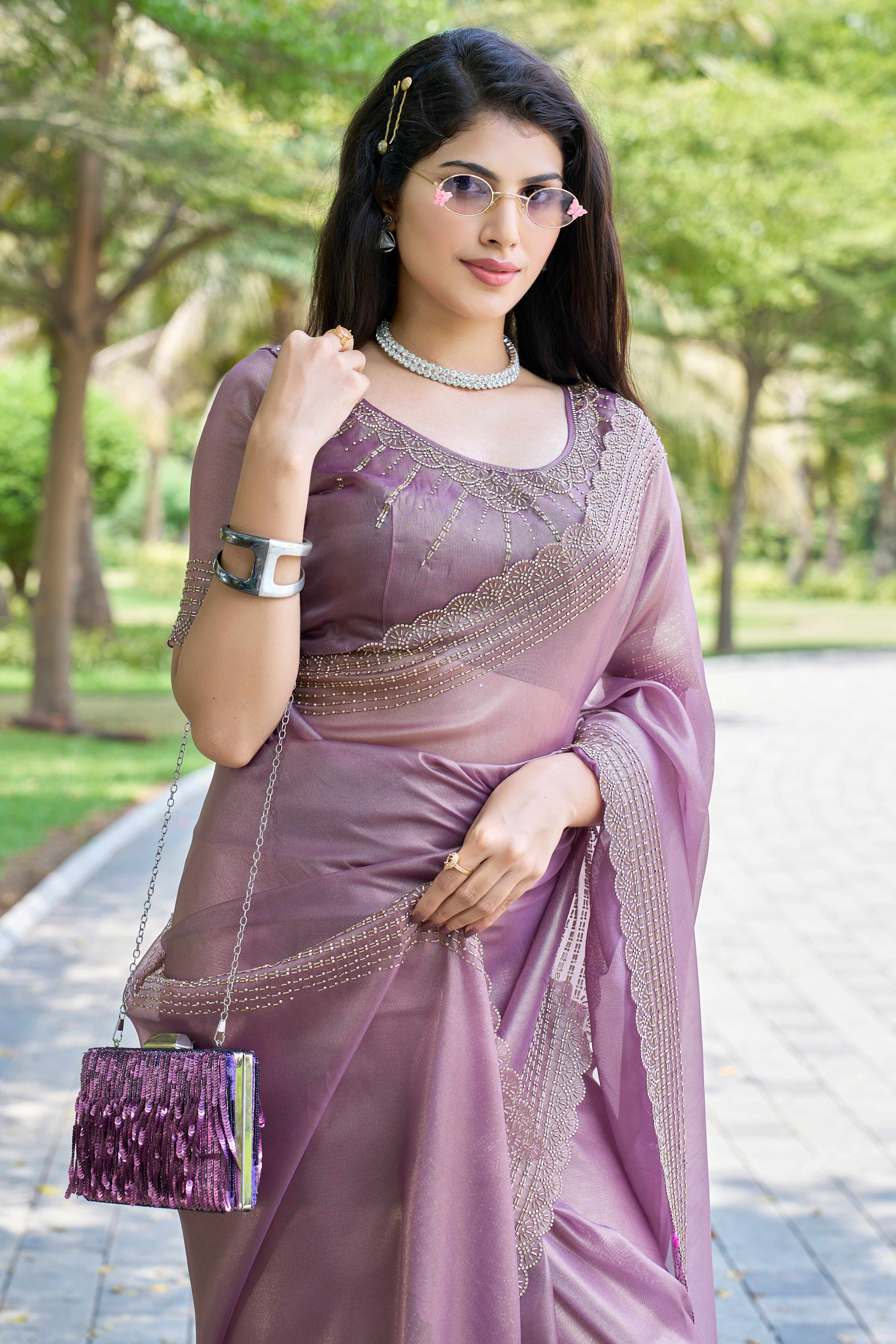 Pastel Purple Soft Organza Saree with Stone Embellishments Work