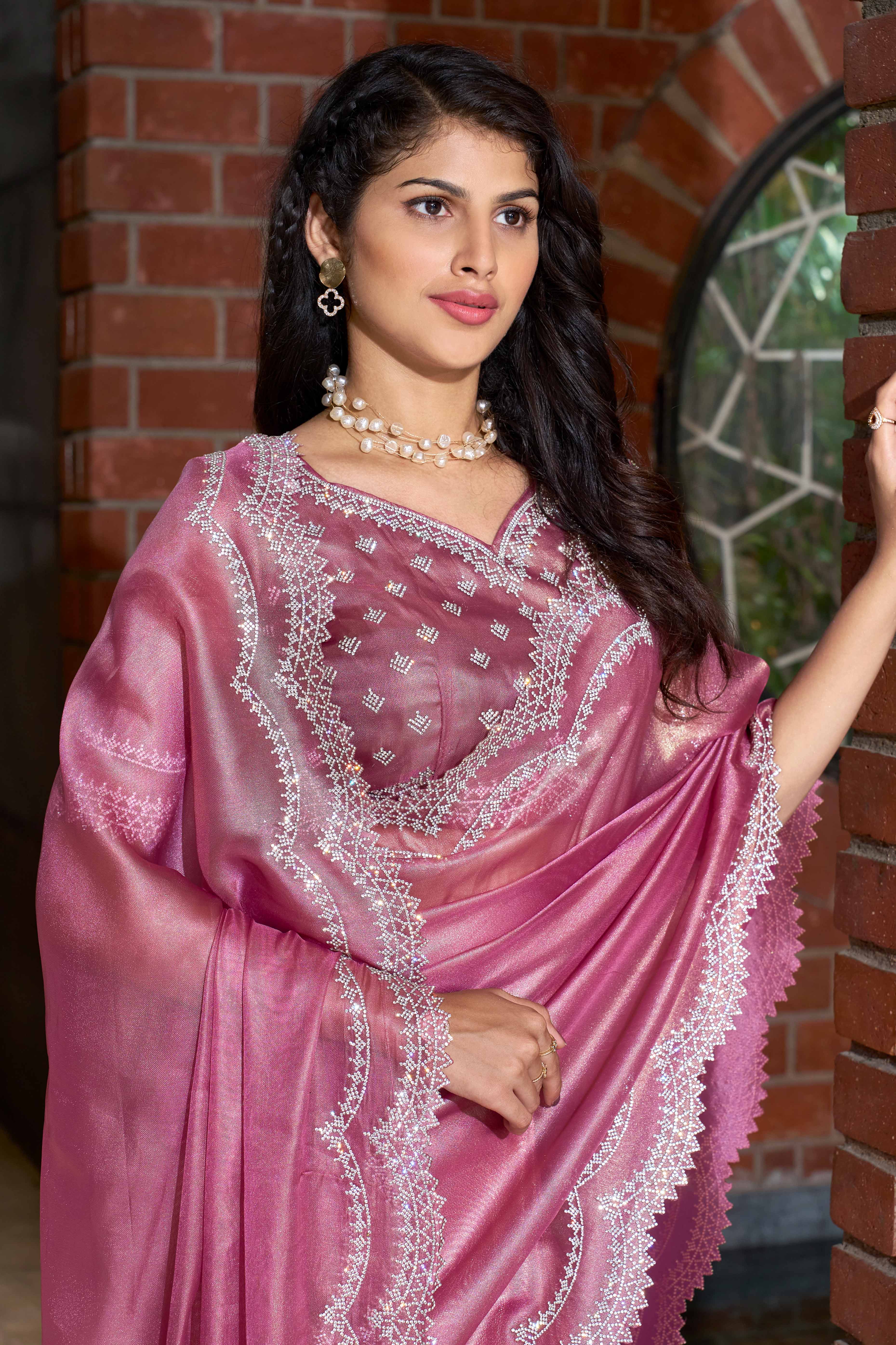 Stunning Pink Organza Solid Saree With a Touch of Zarkan Opulence