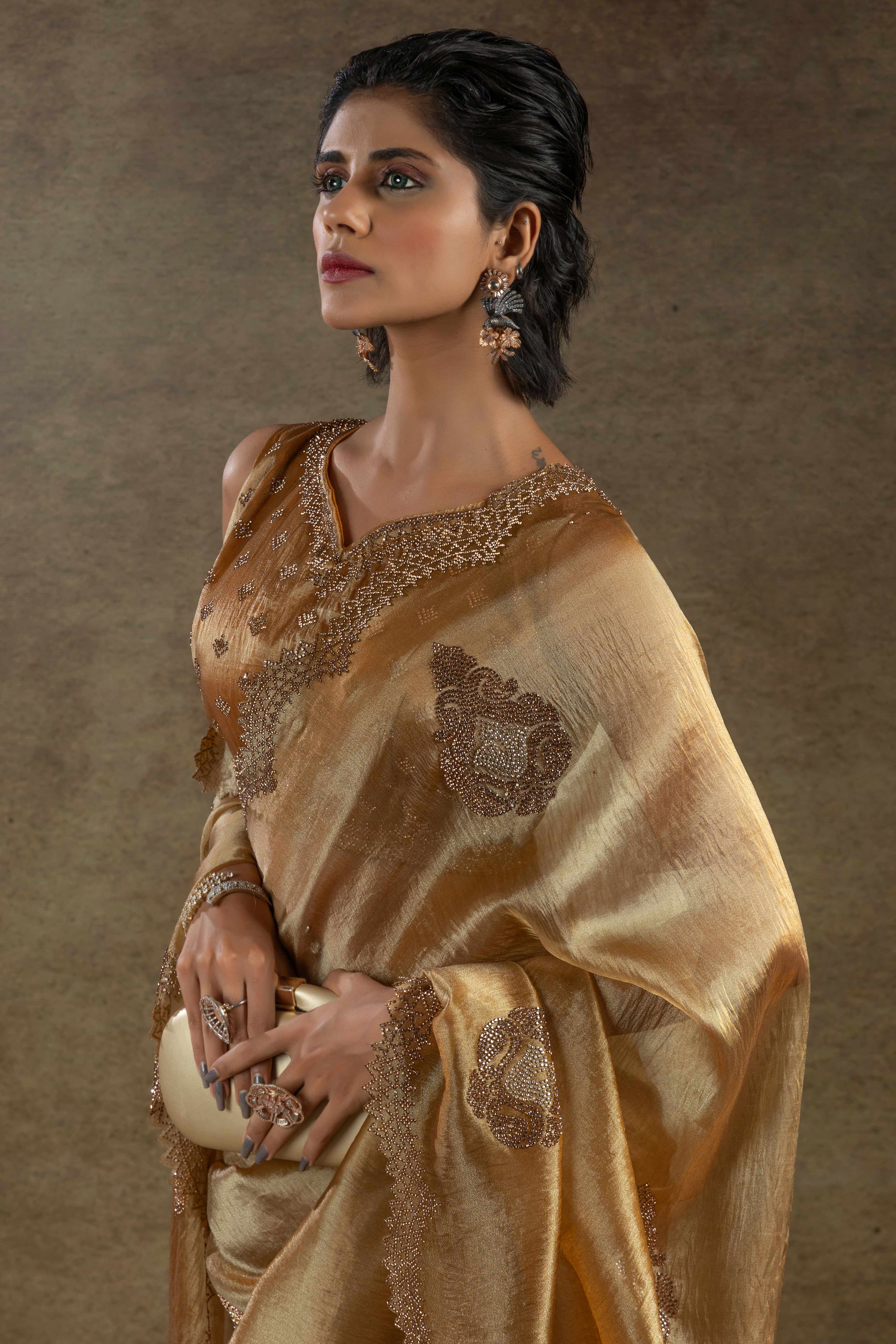 Gold Banarasi Silk Saree with Stone Embellishments Perfect for Party Wear