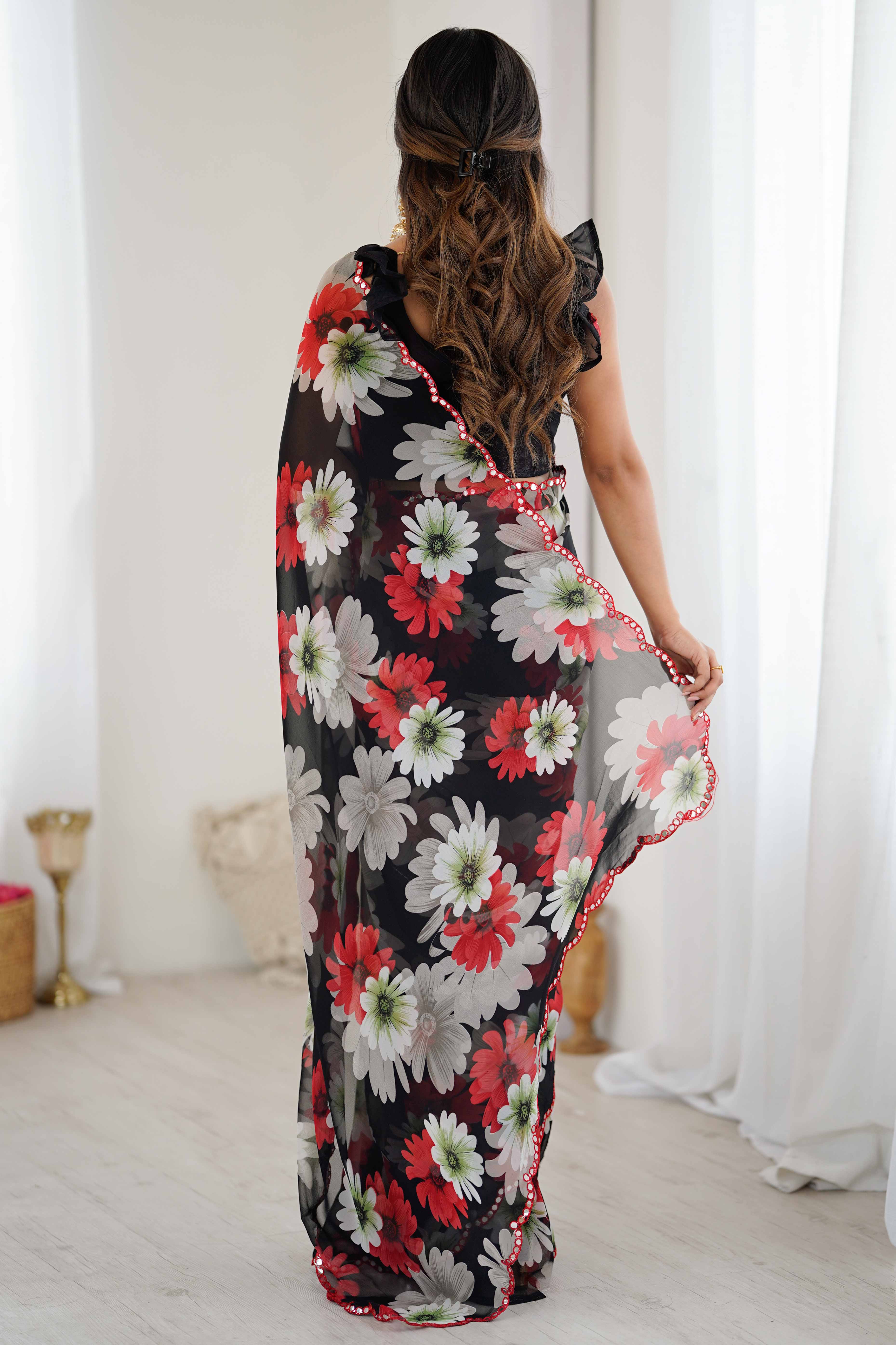 Black Georgette Saree Featuring Floral Prints & Shimmering Mirror Work Border