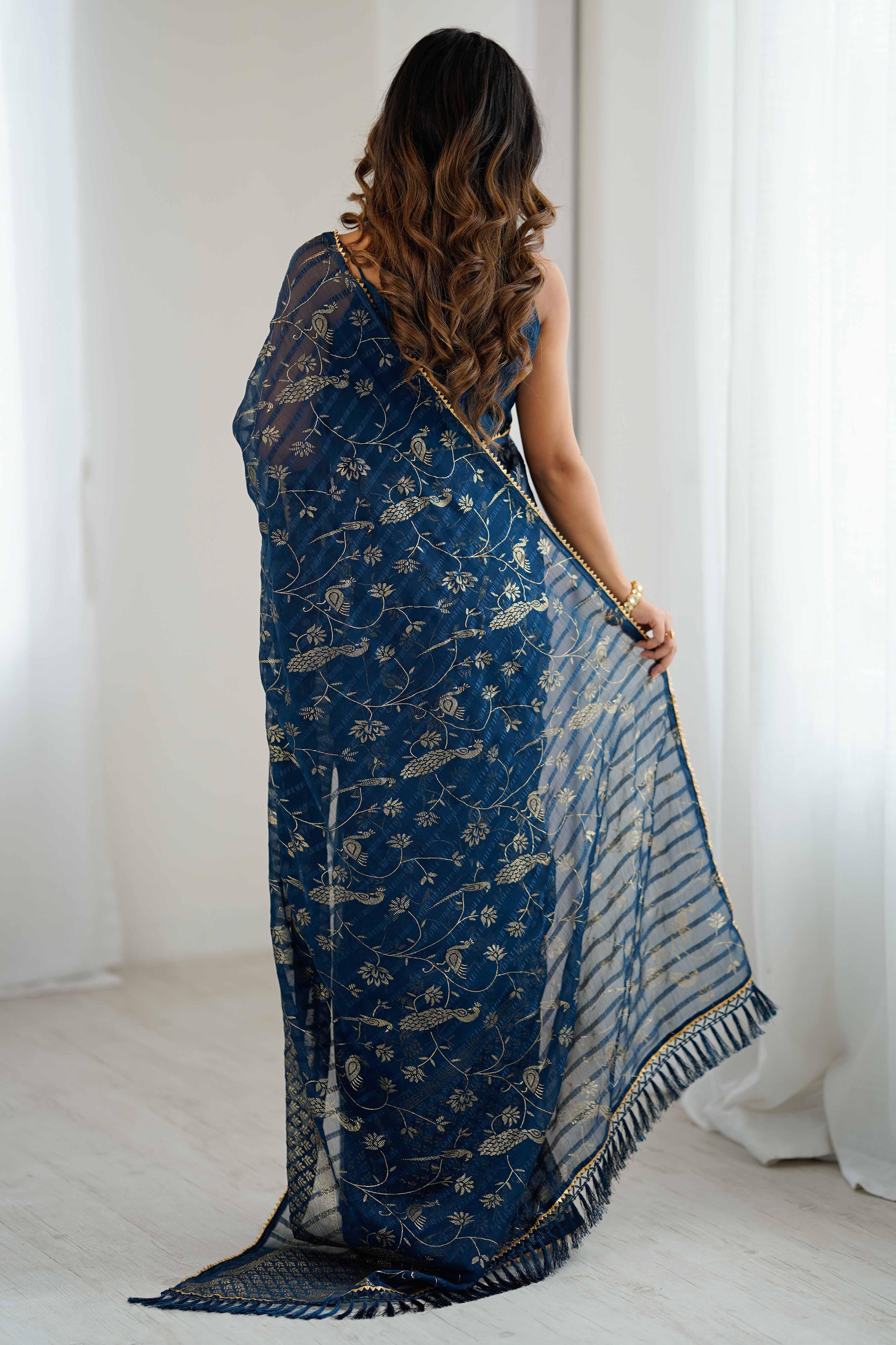 Morpich Blue Georgette Saree with Shimmering Foil Print & Gota Patti Border