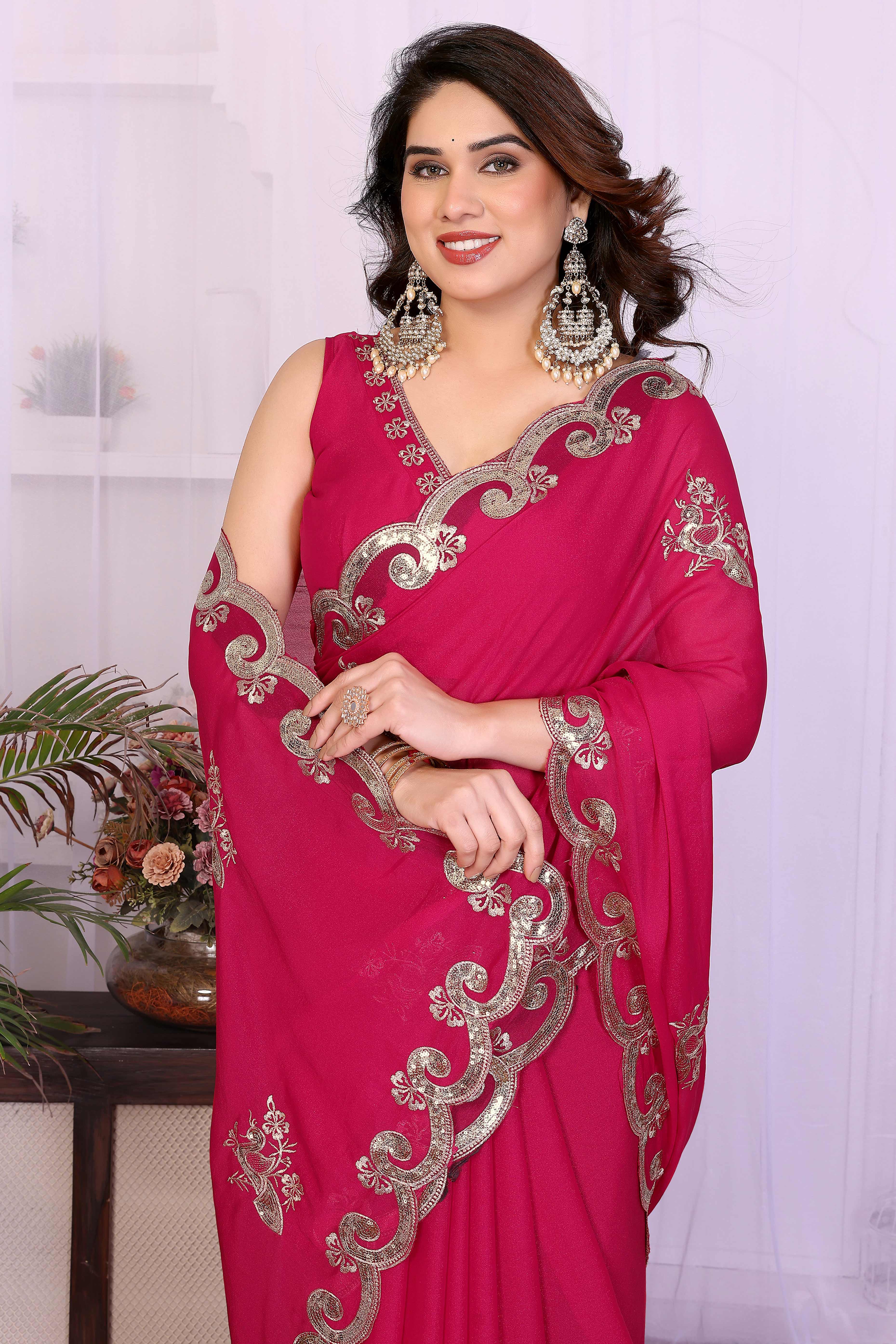 Charming Pink Floral & Peacock Motif Georgette Saree Enhanced With Sequins Embroidery