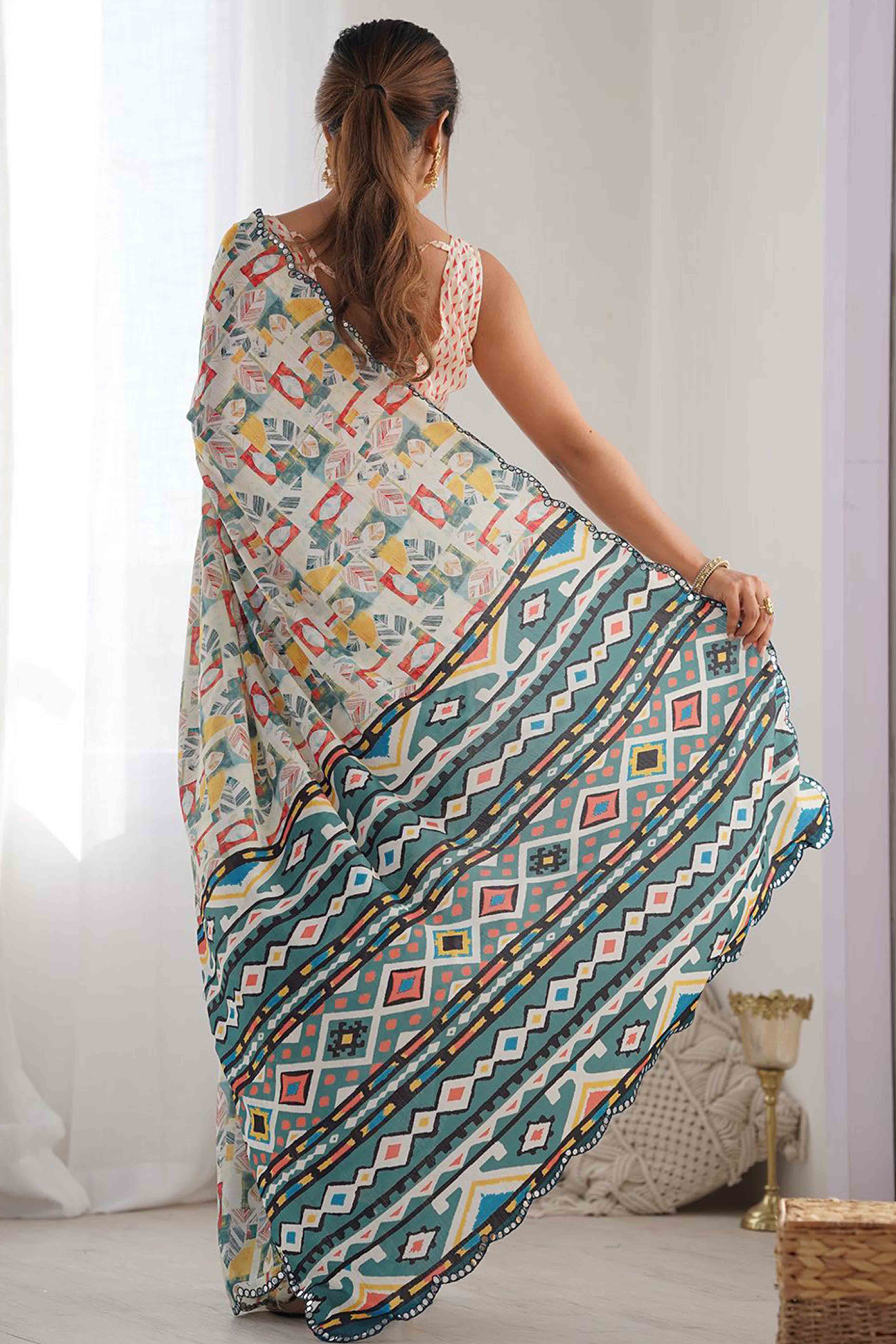 Offwhite Digital Print Georgette Saree Enhanced With A Sparkling Lace Border