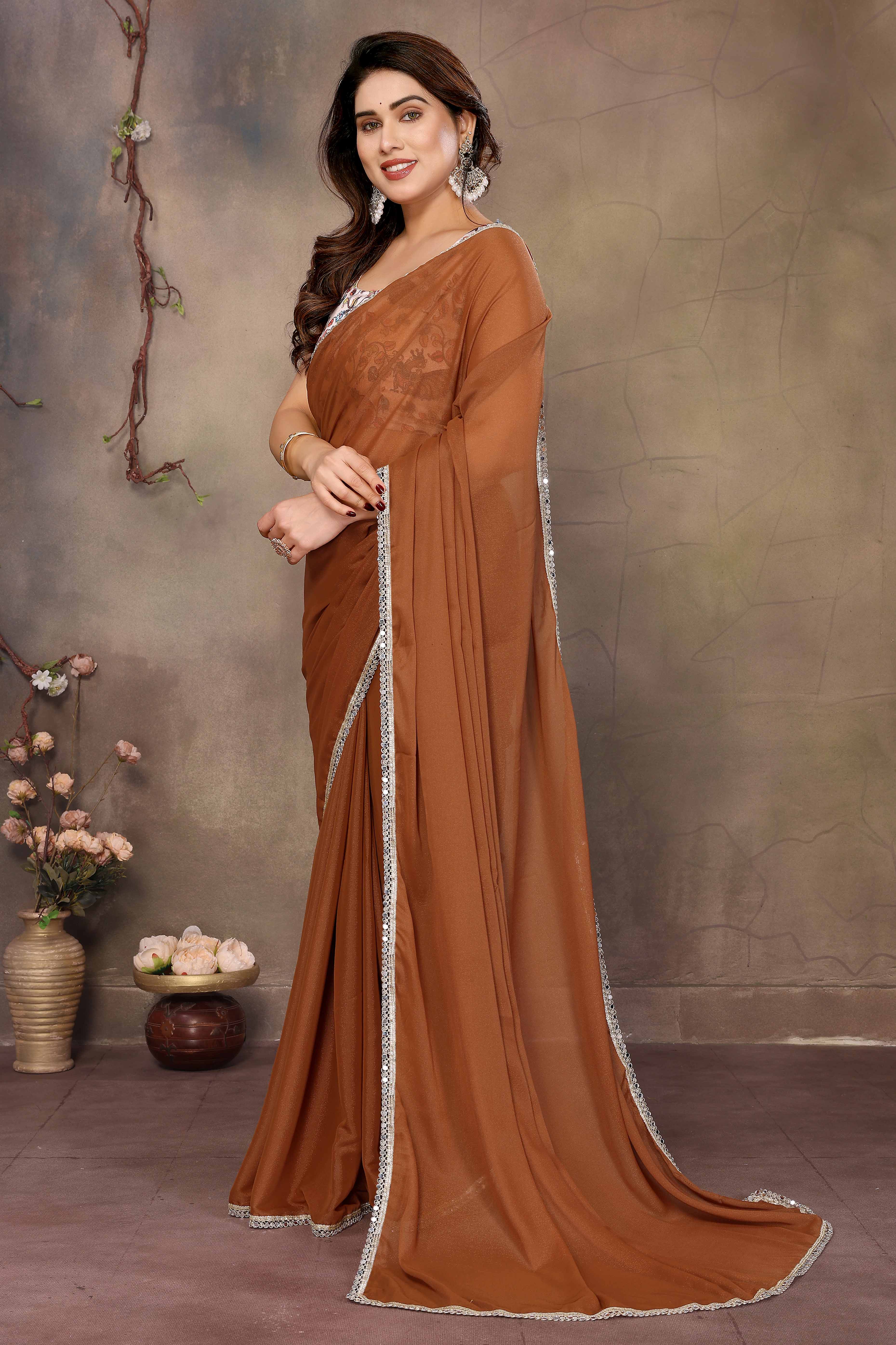 Brown Solid Sparkling Georgette Saree Enhanced With Shimmering Mirror Border