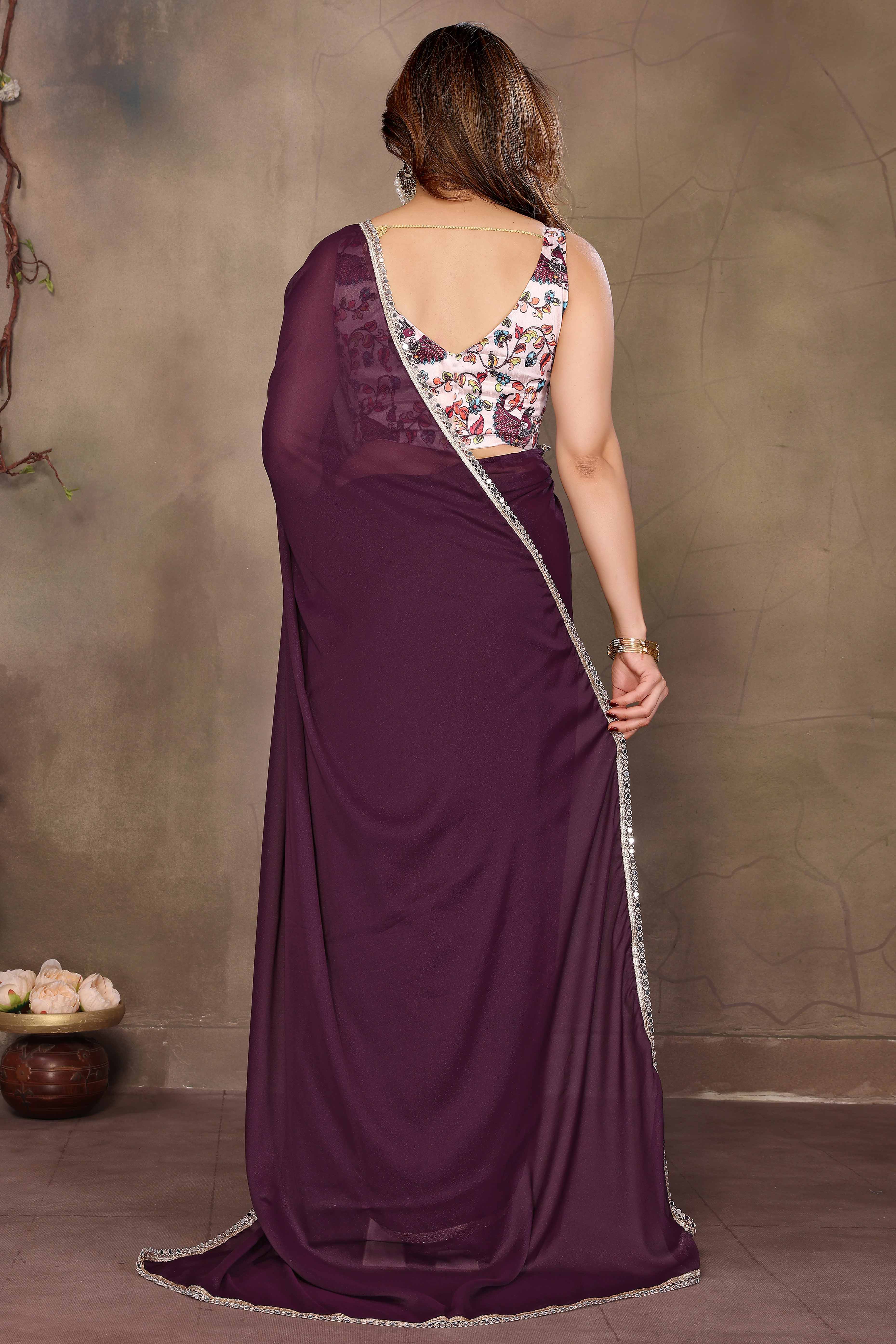 Wine Solid Sparkling Georgette Saree Enhanced With Shimmering Mirror Border