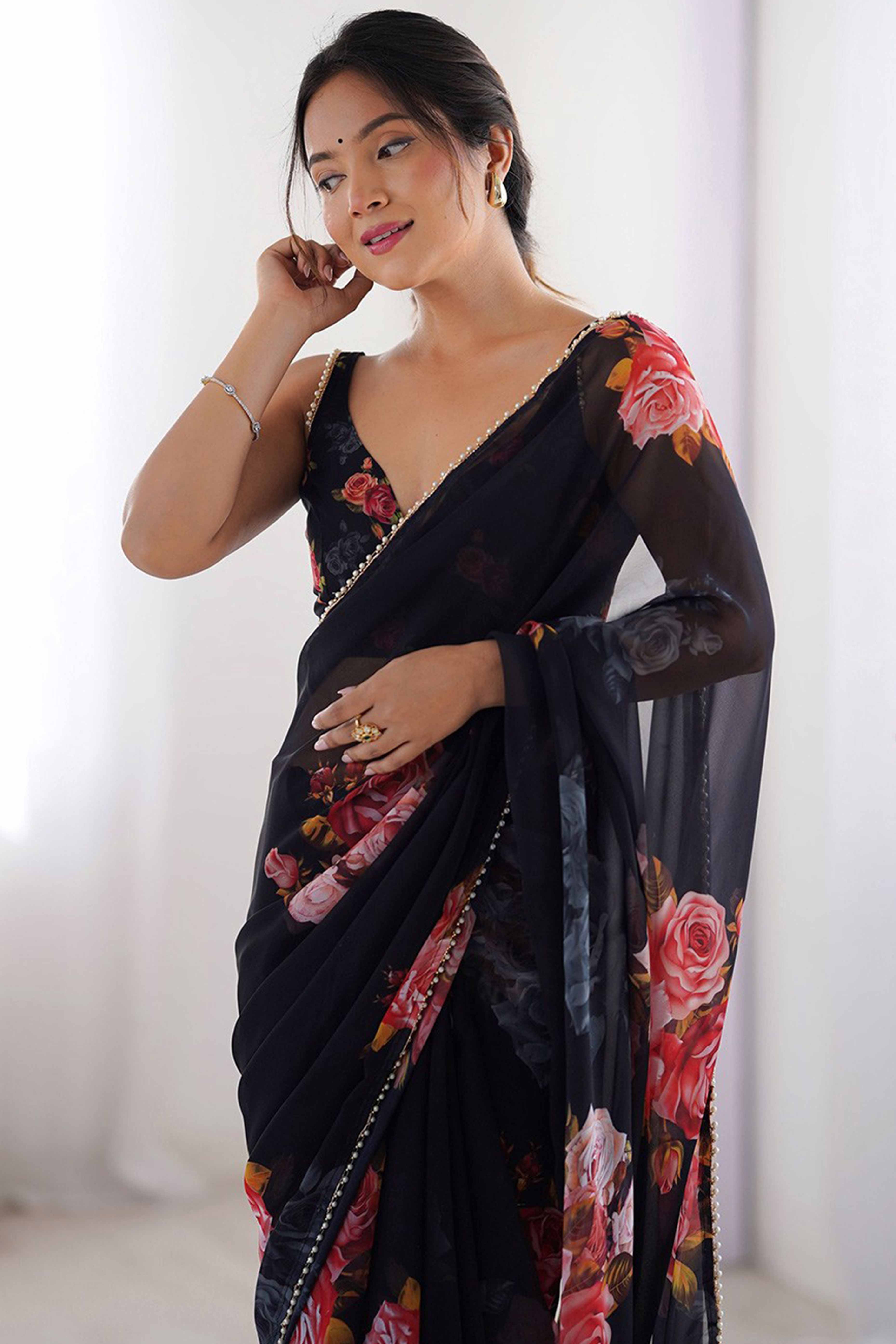 Partywear Black Georgette Saree with Floral Prints and Bead Work Lace