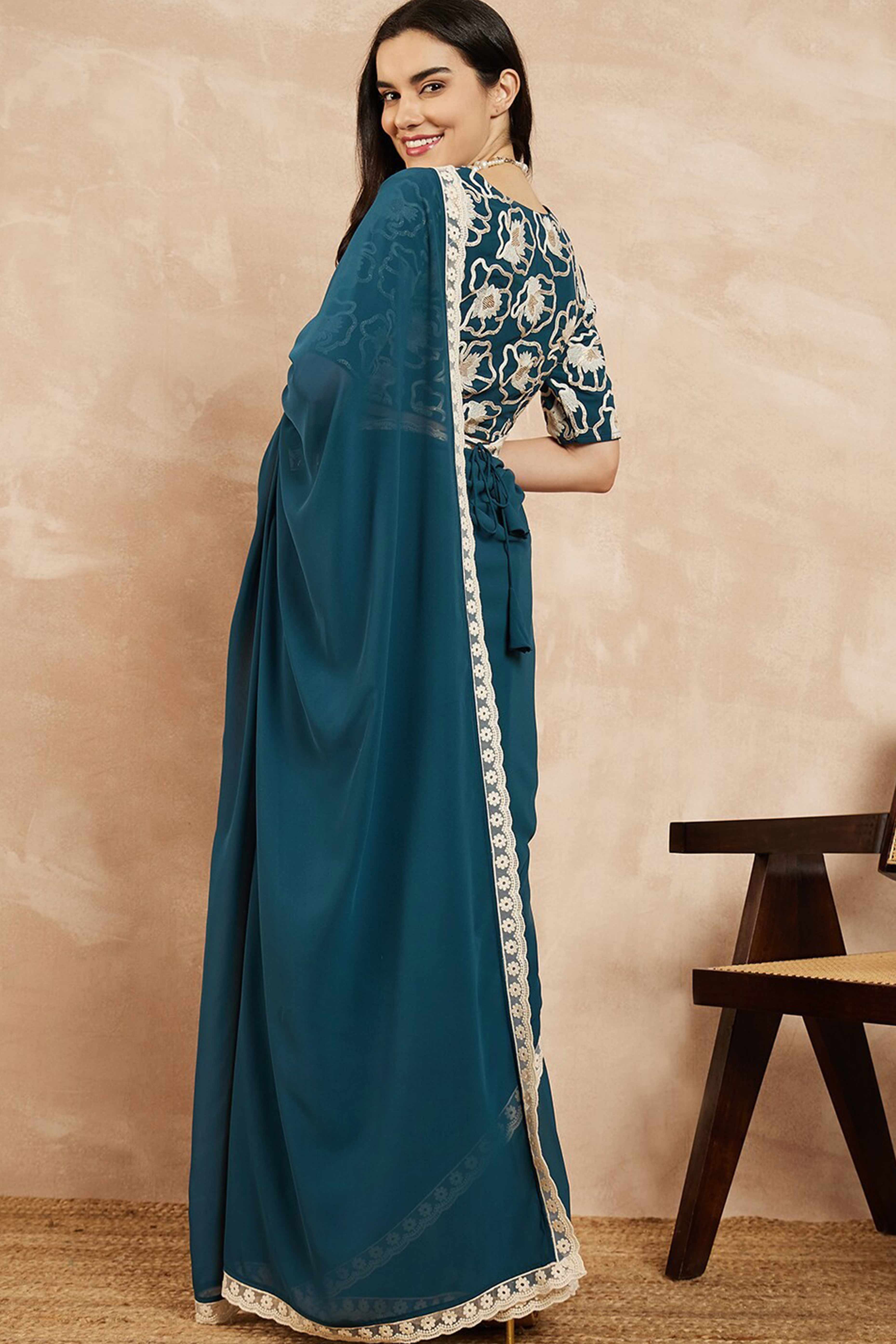 Teal Blue Solid Georgette Saree With Embroidered Border