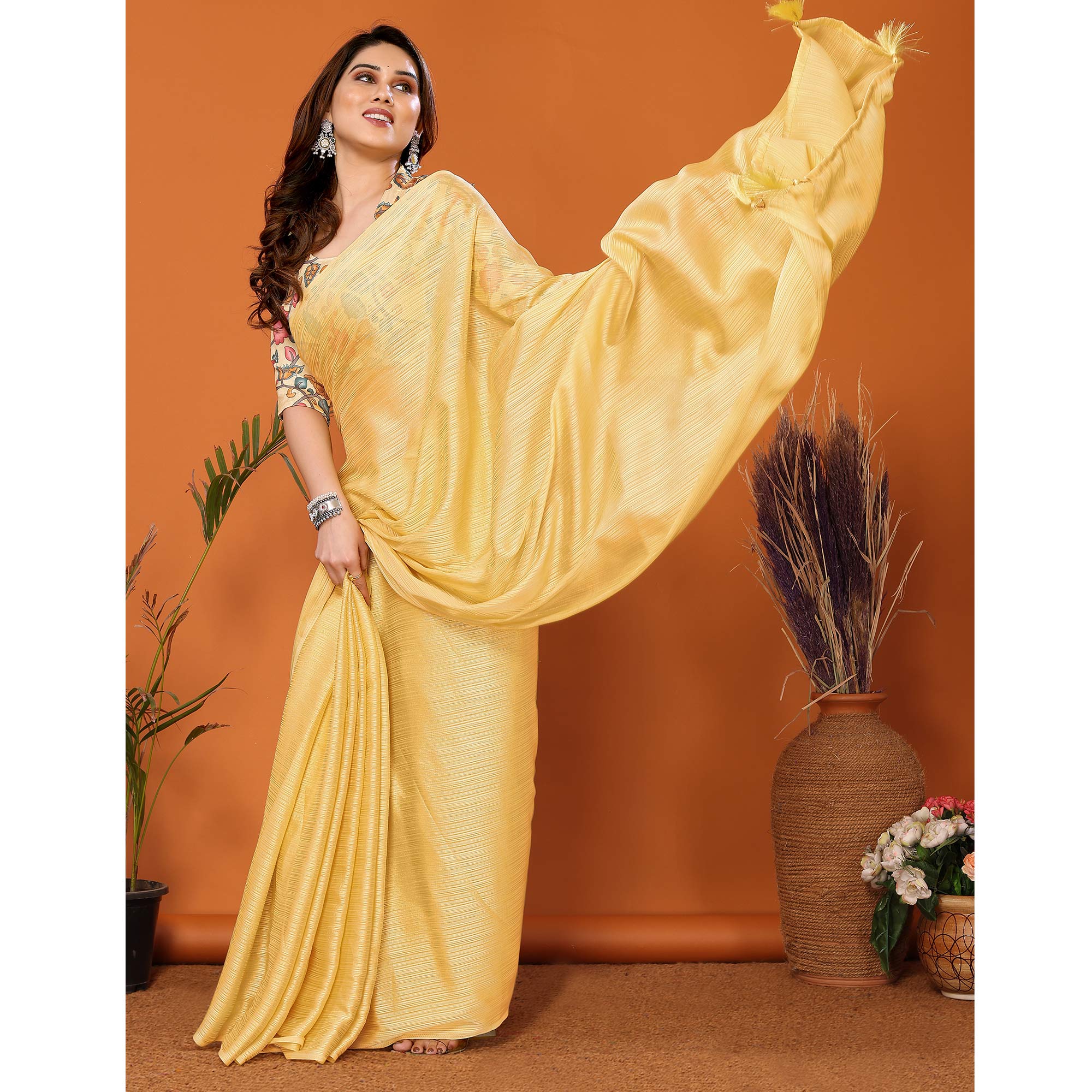 Yellow Woven Satin Saree With Tassels