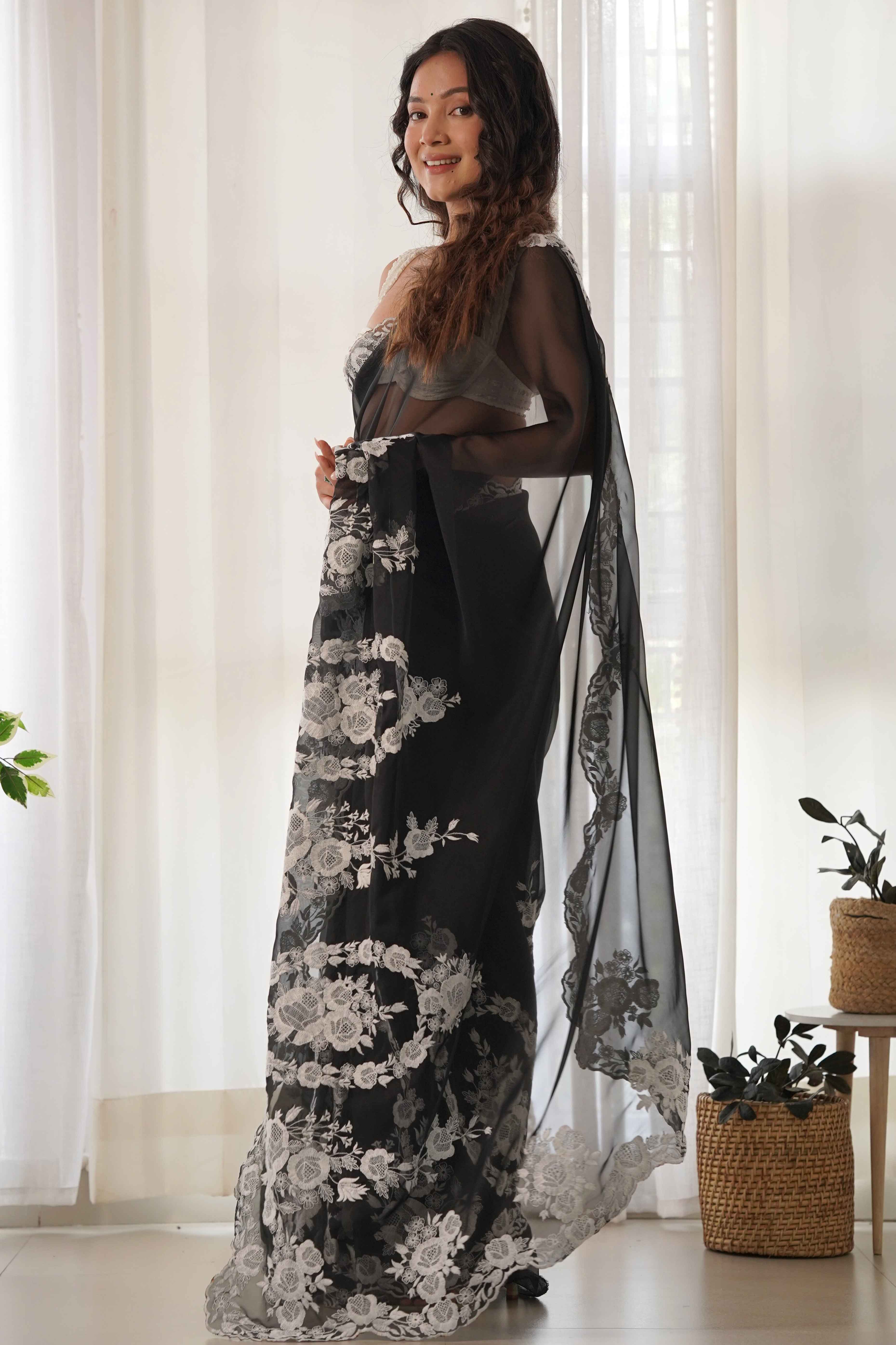 Black Embroidered Georgette Saree Featuring Ornate Heavy Thread Work