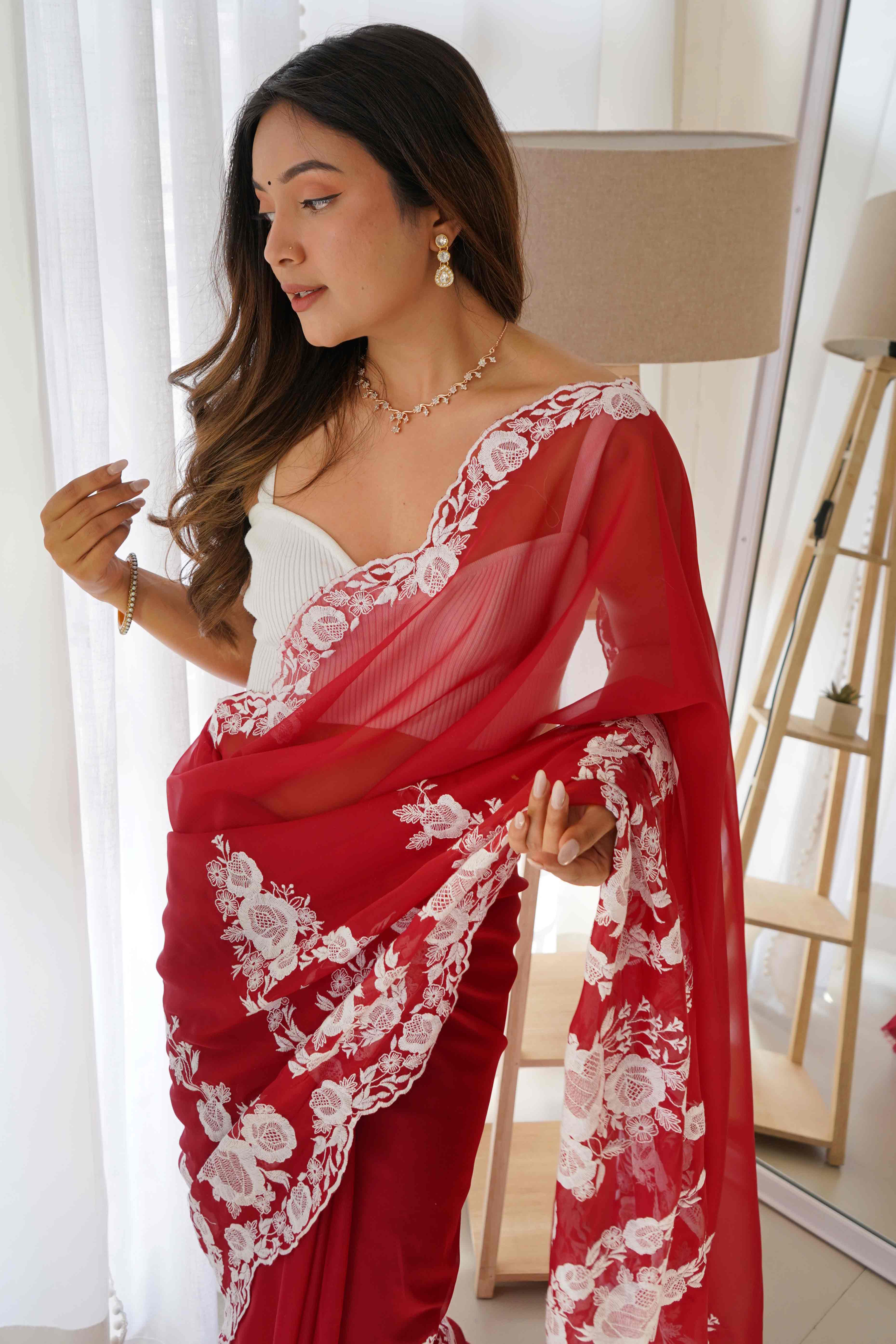 Red Embroidered Georgette Saree Featuring Ornate Heavy Thread Work