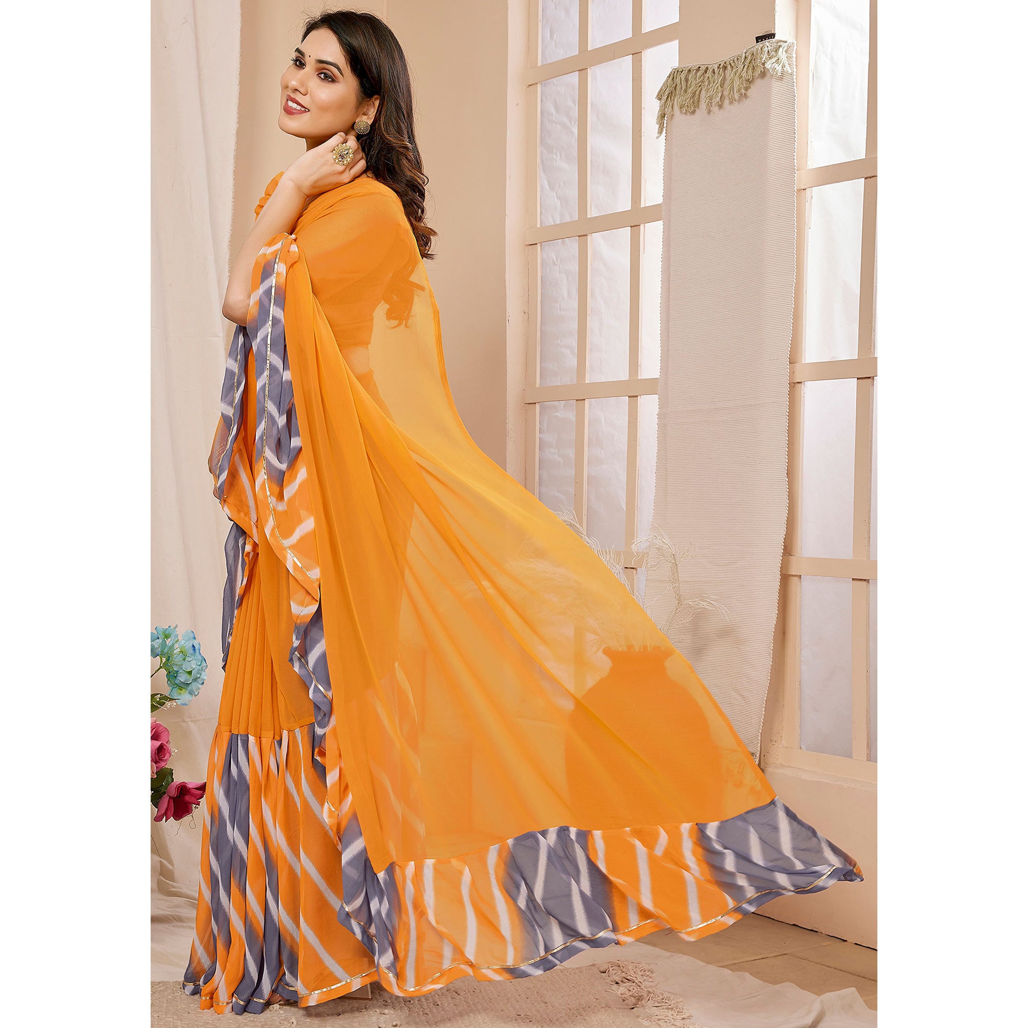 Orange Solid Georgette Saree With Printed Ruffle Border