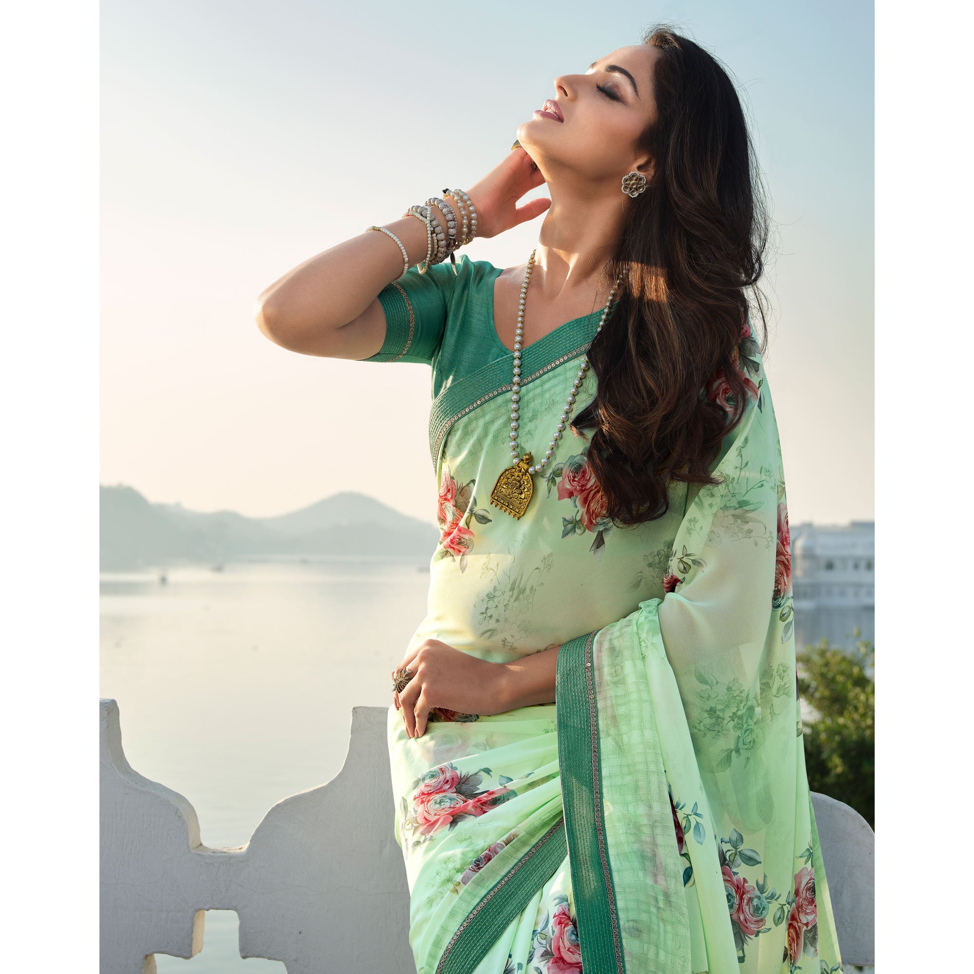 Turquoise Floral Printed With Embroidered Border Georgette Saree