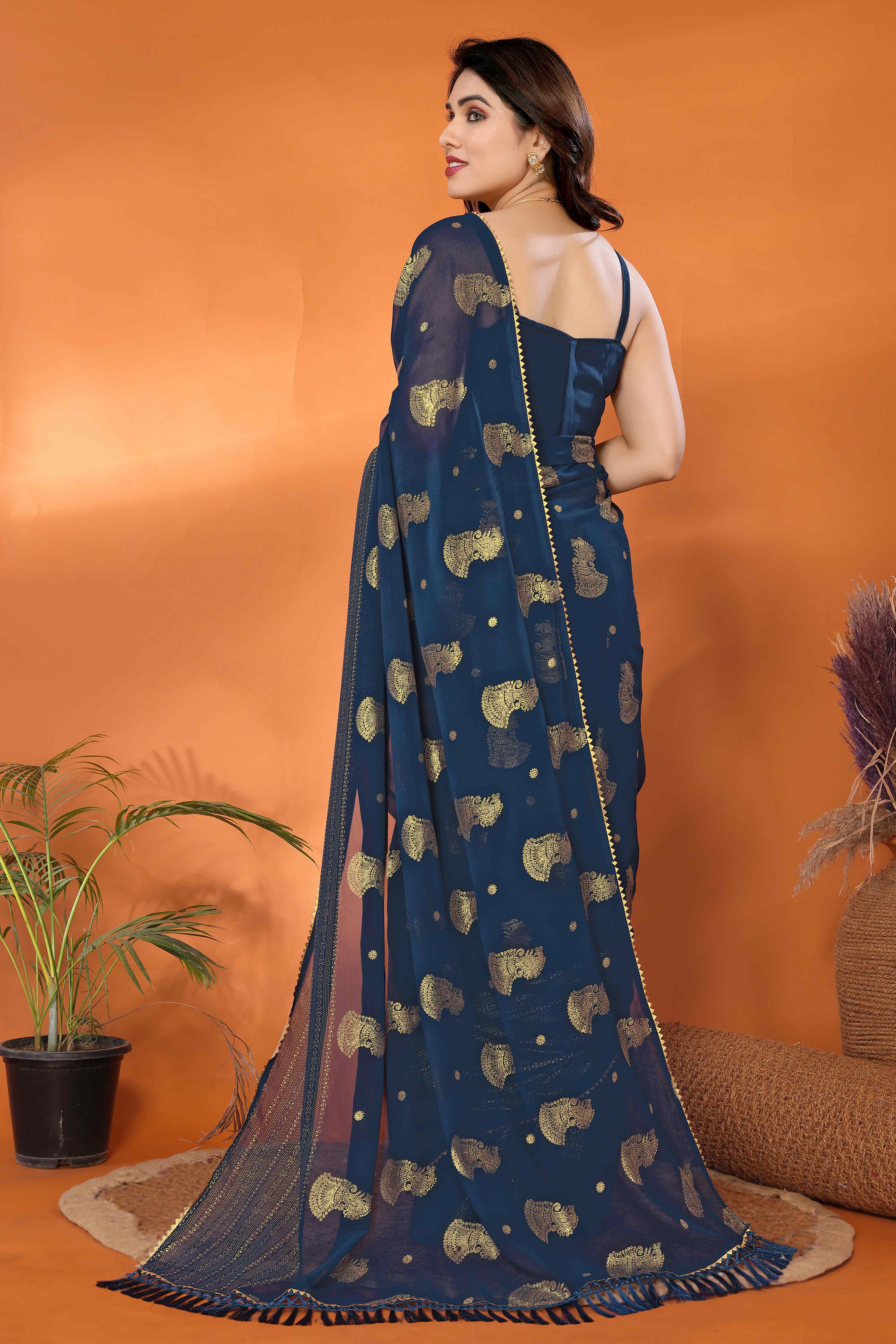 Teal Foil Printed Georgette Saree