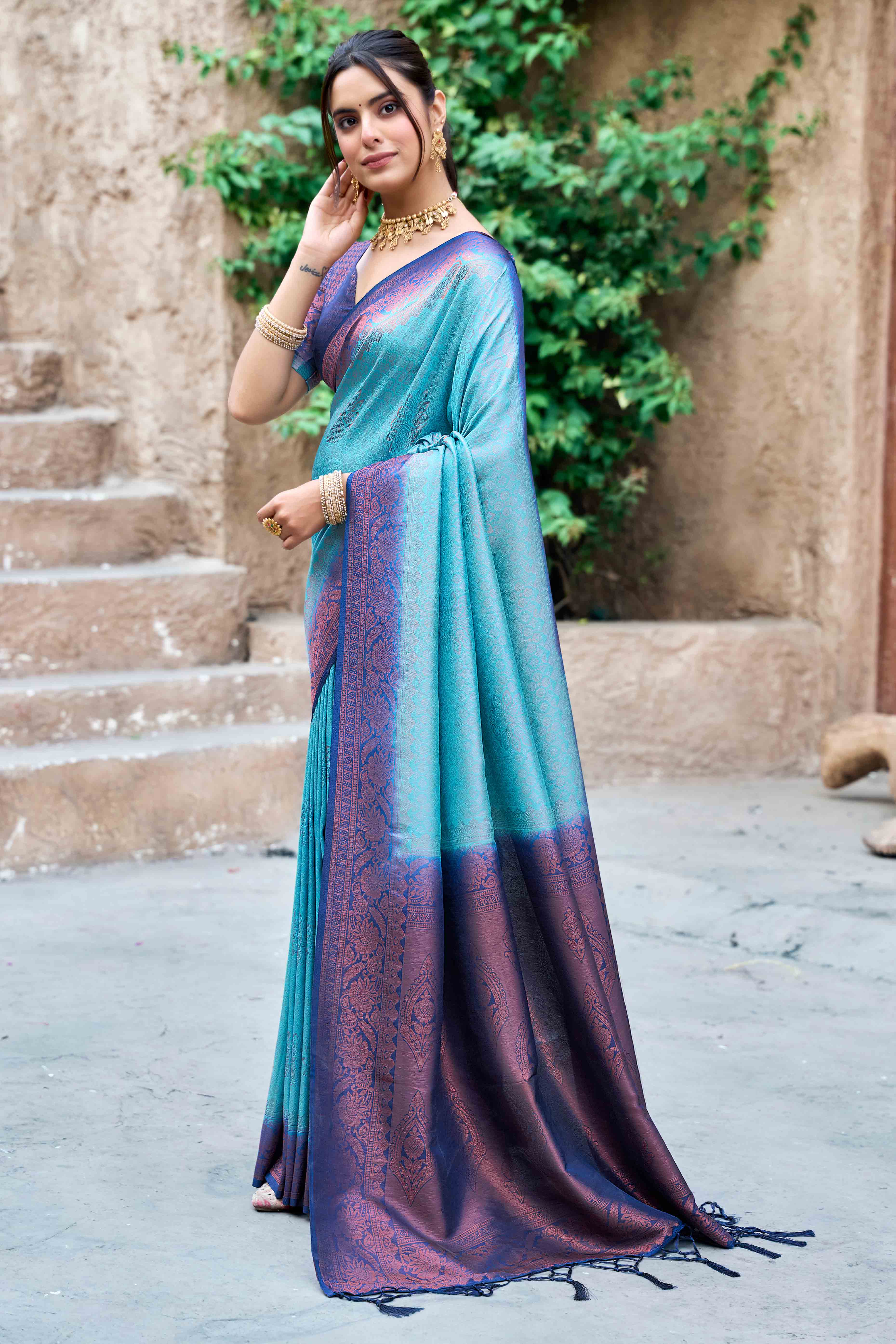 Blue Banarasi Silk Saree Featuring Elegant Floral Woven & Delicate Tassel Edging