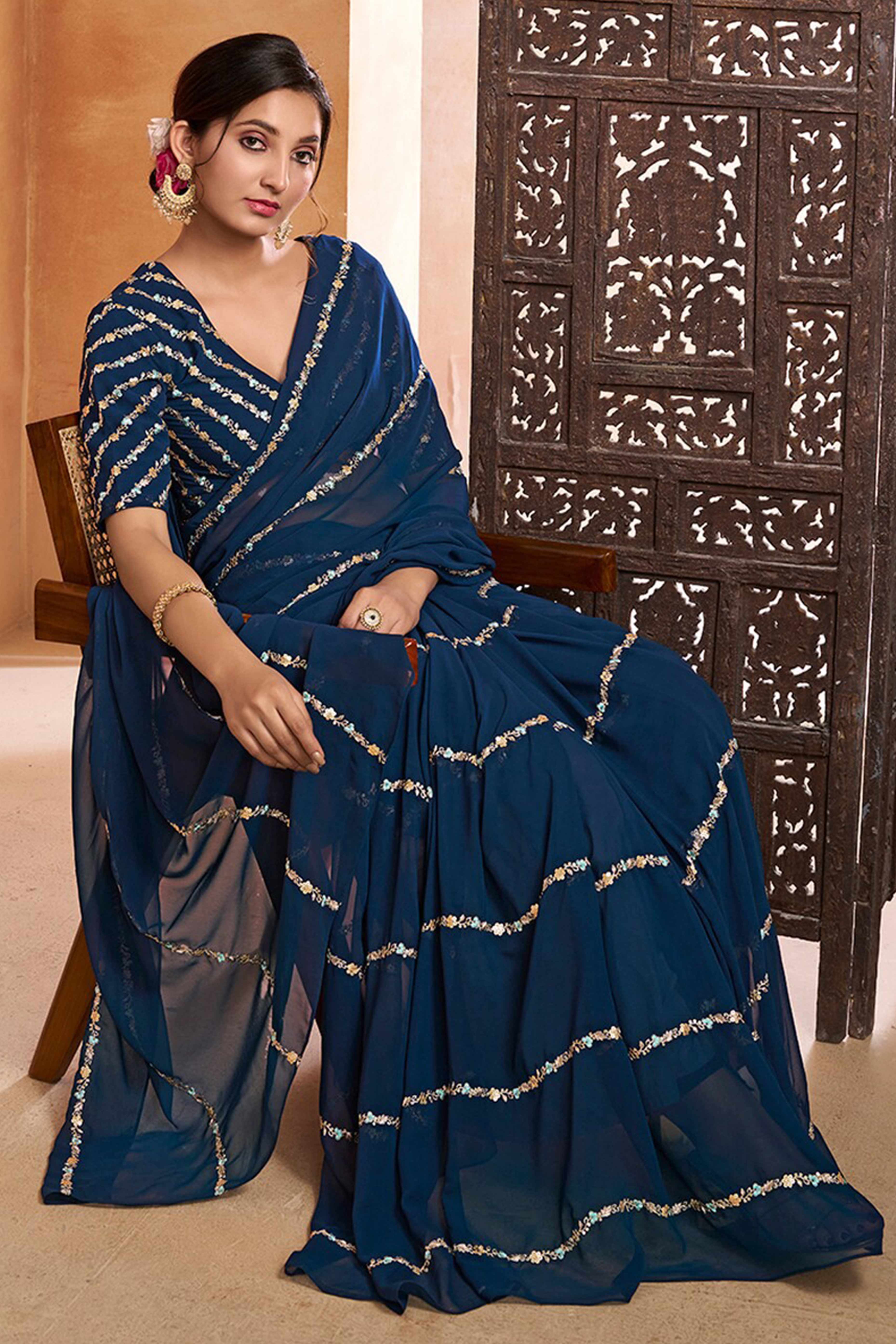 Graceful Blue Floral Georgette Saree Embellished With Fine Sequins Embroidery