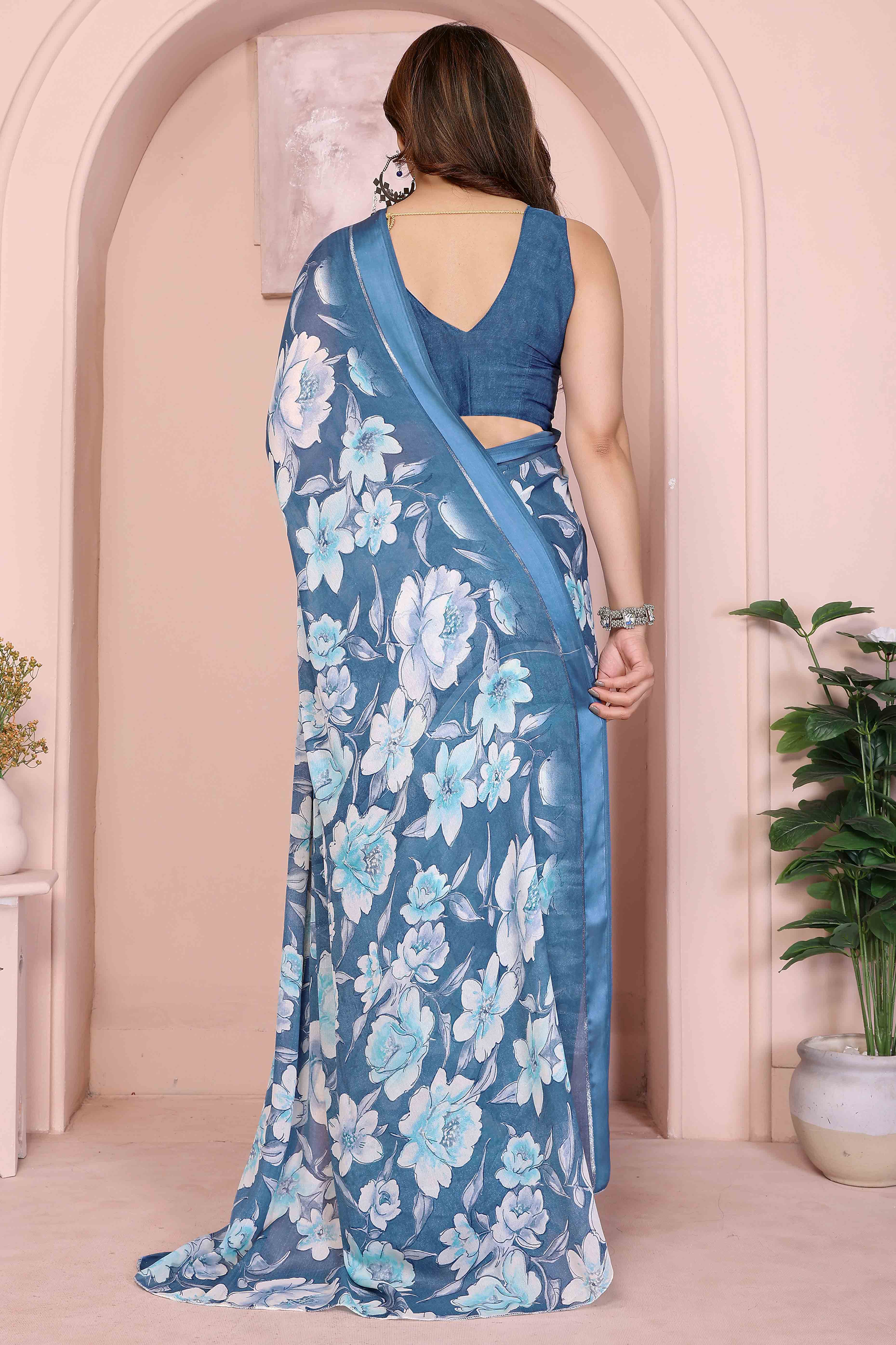 Blue Crepe Saree Accentuated With Satin Patta & Floral Print Detailing