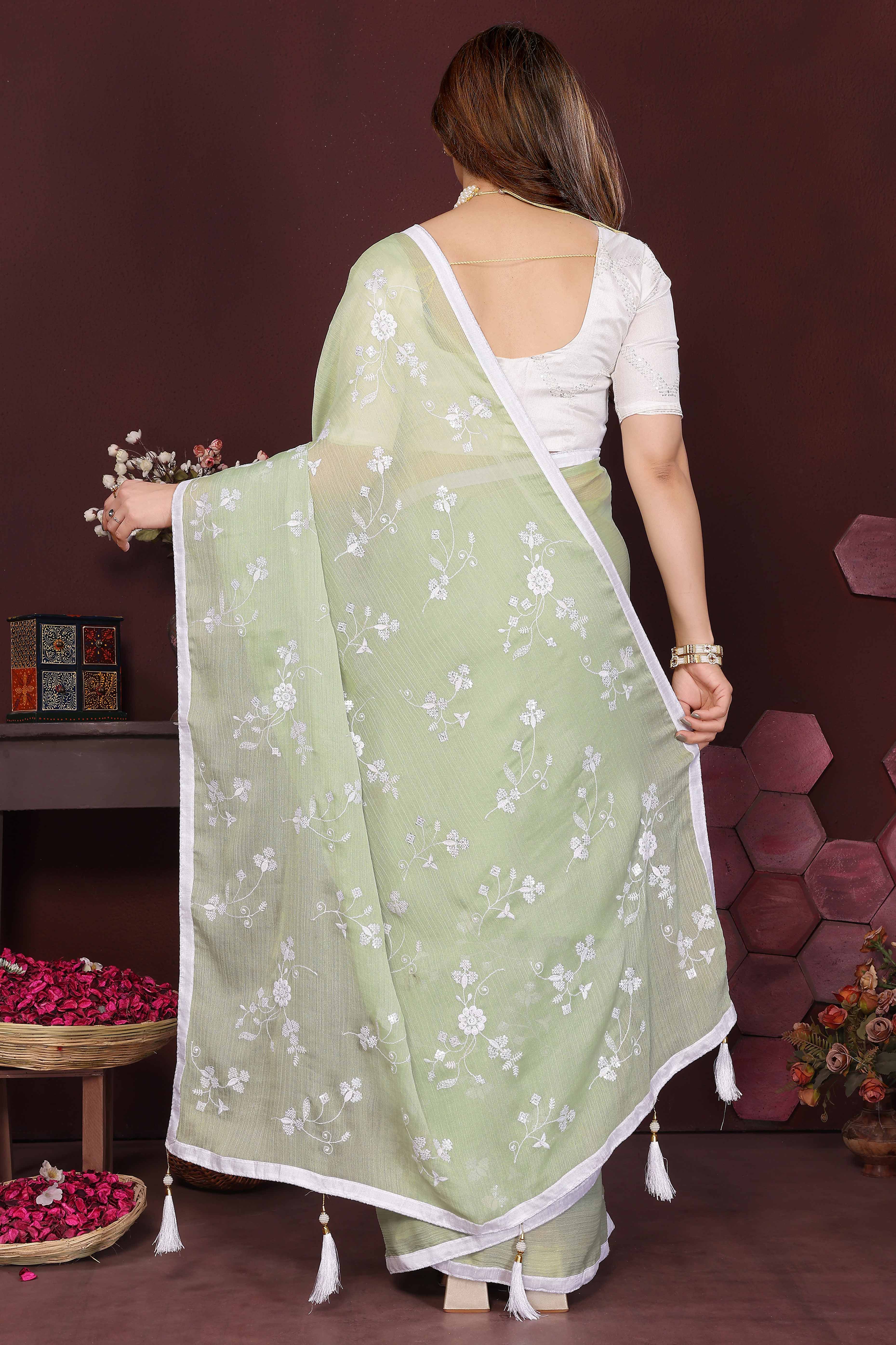 Pista Green Bloom Saree adorned with Moss Floral Embroidery and Delicate Lace Border