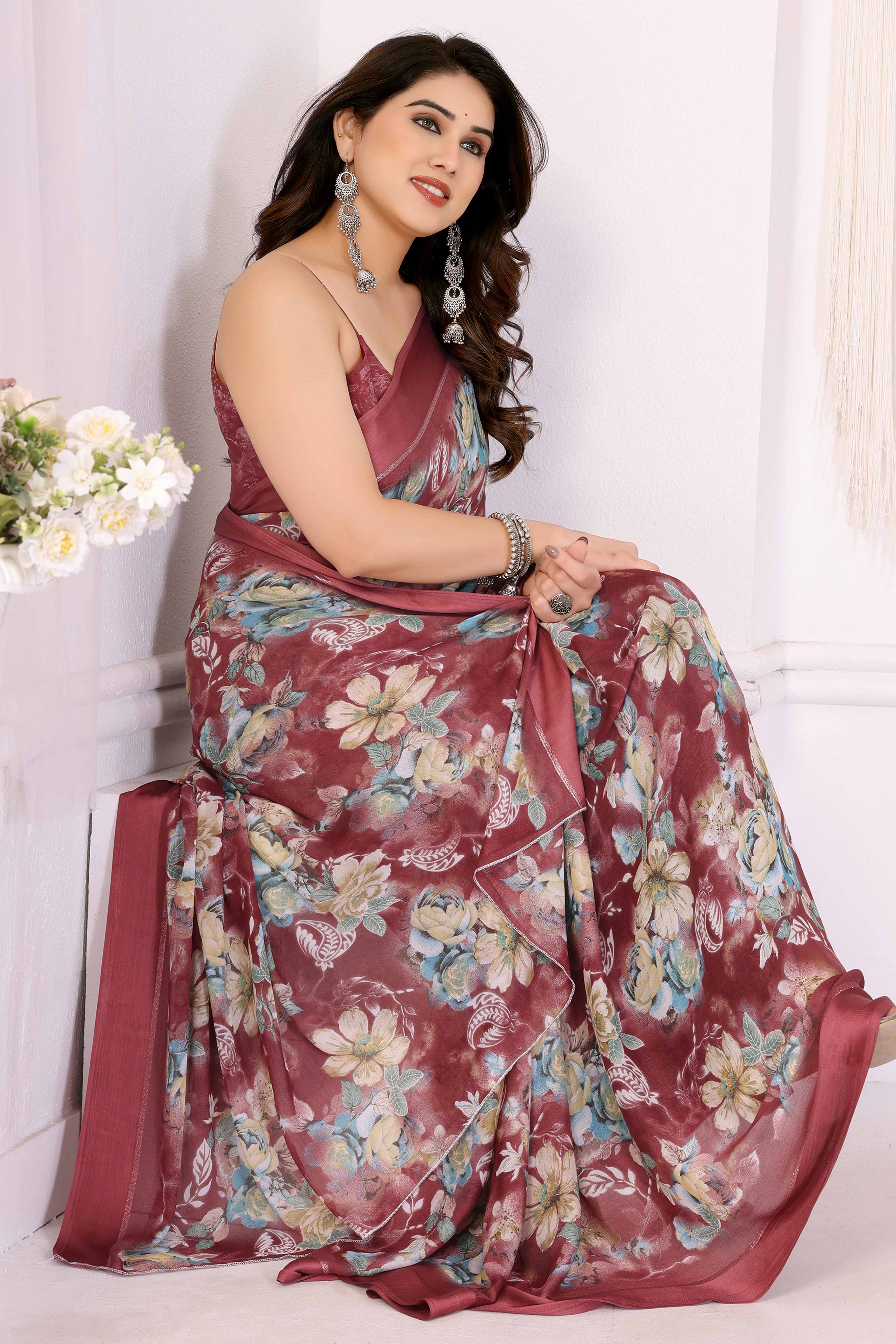 Maroon Floral Printed Crepe Saree Enhanced With A Lustrous Satin Patta Border