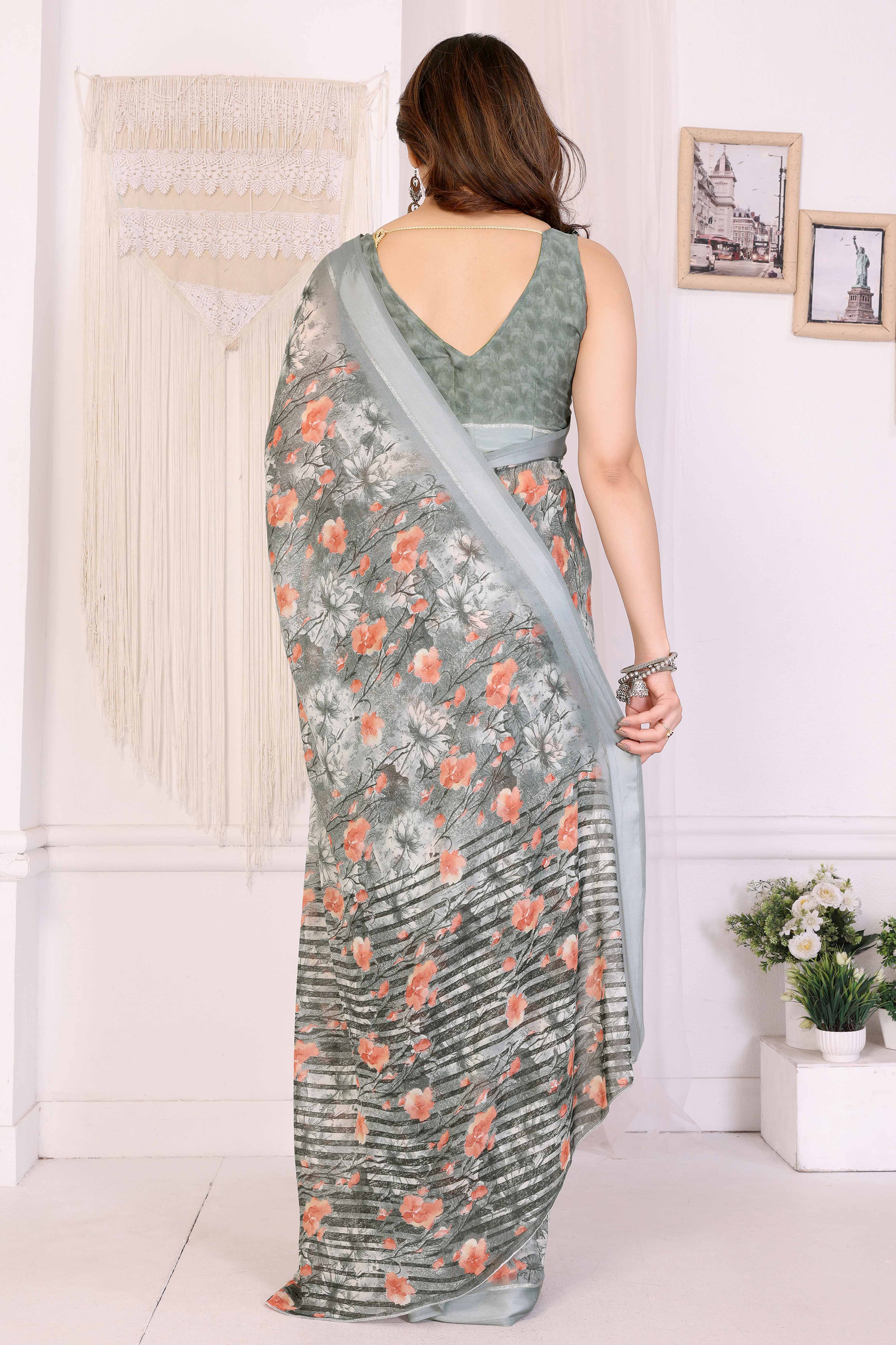 Light Green Floral Printed Blue Crepe Saree Styled With A Smooth Satin Patta Border