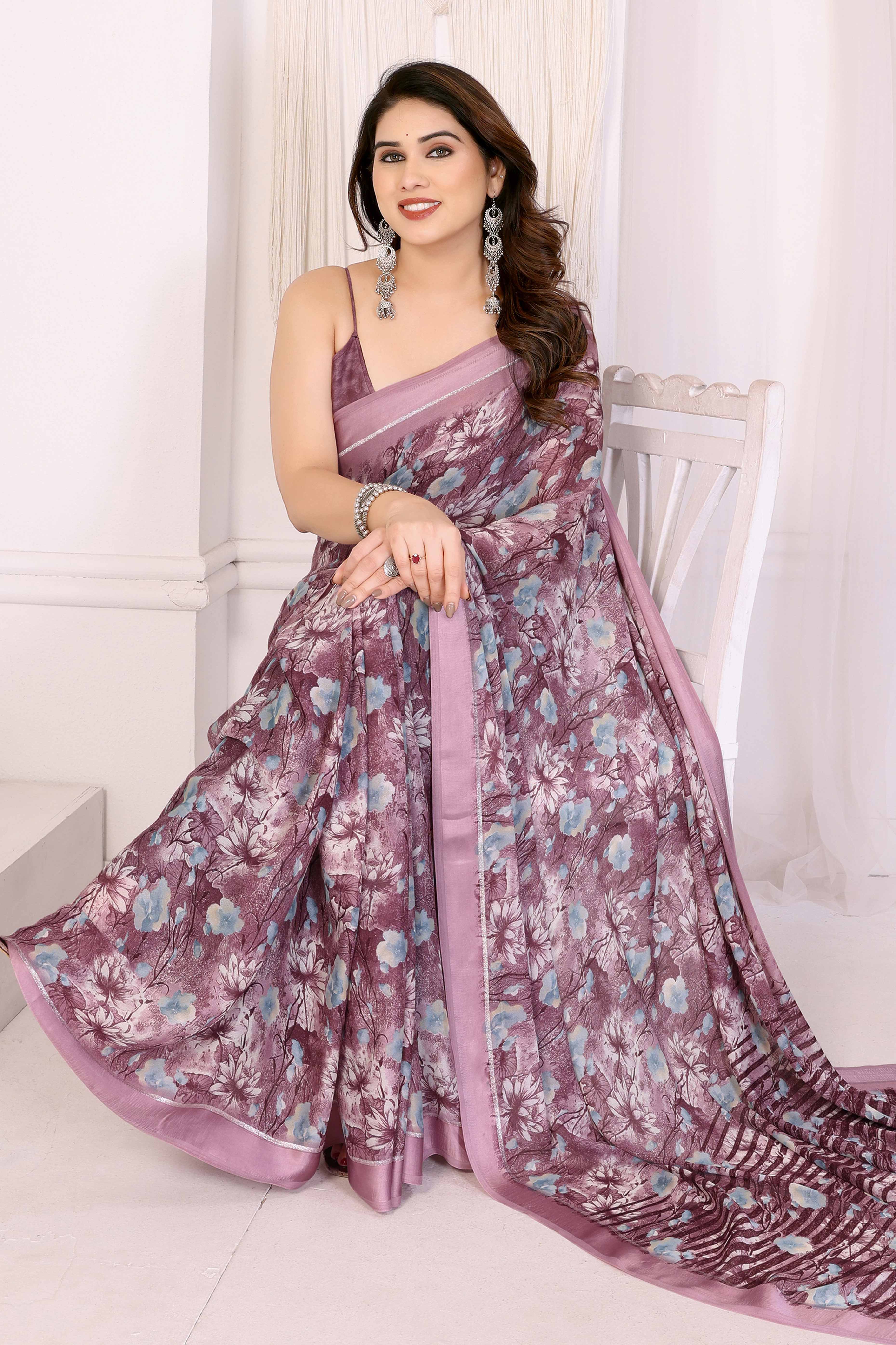 Mauve Floral Printed Blue Crepe Saree Styled With A Smooth Satin Patta Border