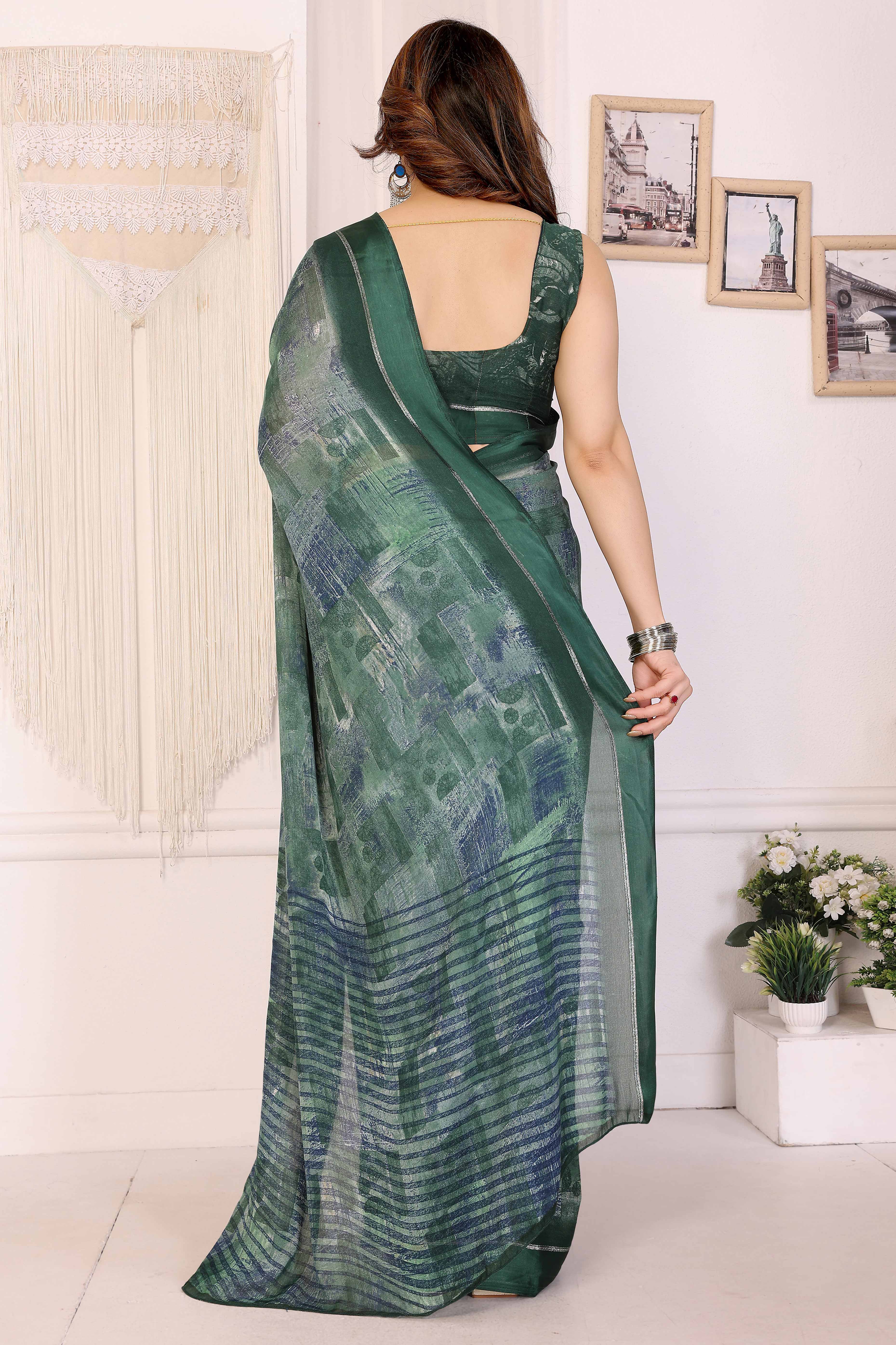 Trendy Green Moss Crepe Saree with Floral Motifs and Satin Border