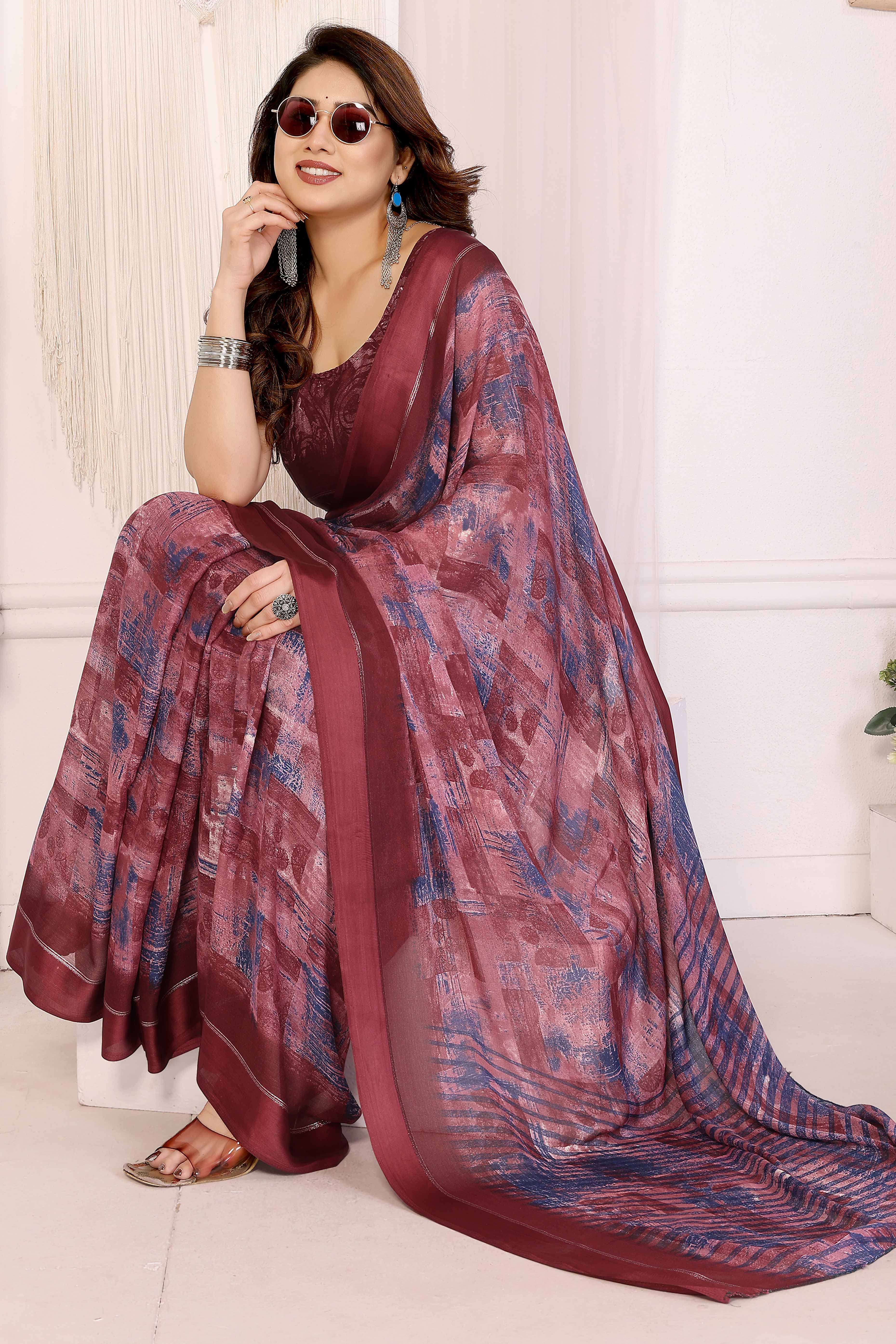 Trendy Maroon Moss Crepe Saree with Floral Motifs and Satin Border