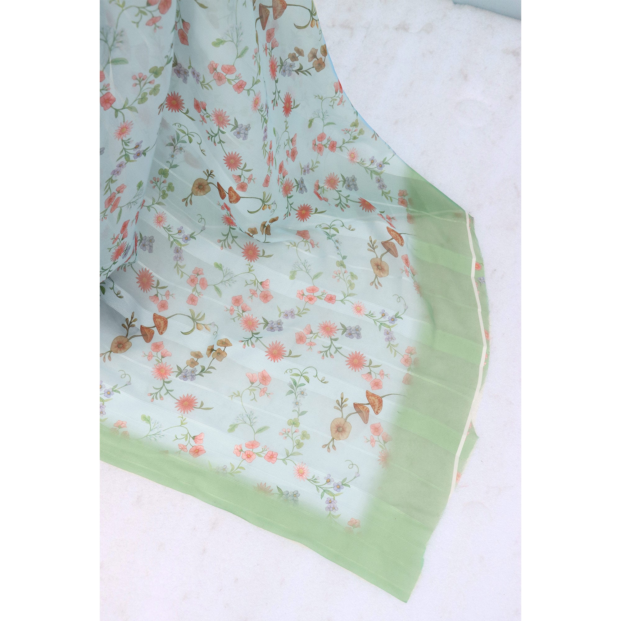 Sky Blue Bloom Floral Digital Printed Georgette Saree Accentuated With Graceful Zari Stripes