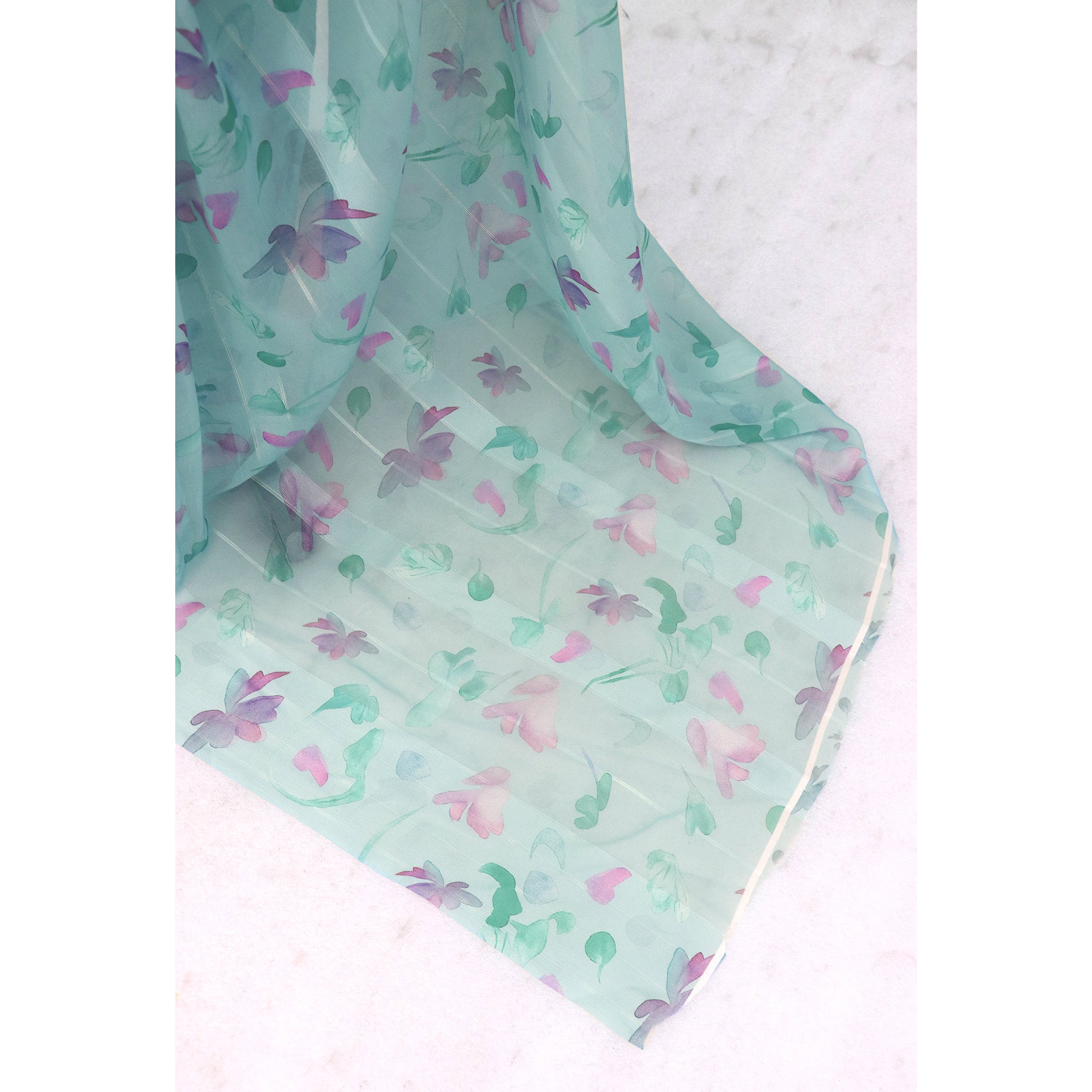 Sky Blue Bloom Floral Digital Printed Georgette Saree Accentuated With Graceful Zari Stripes