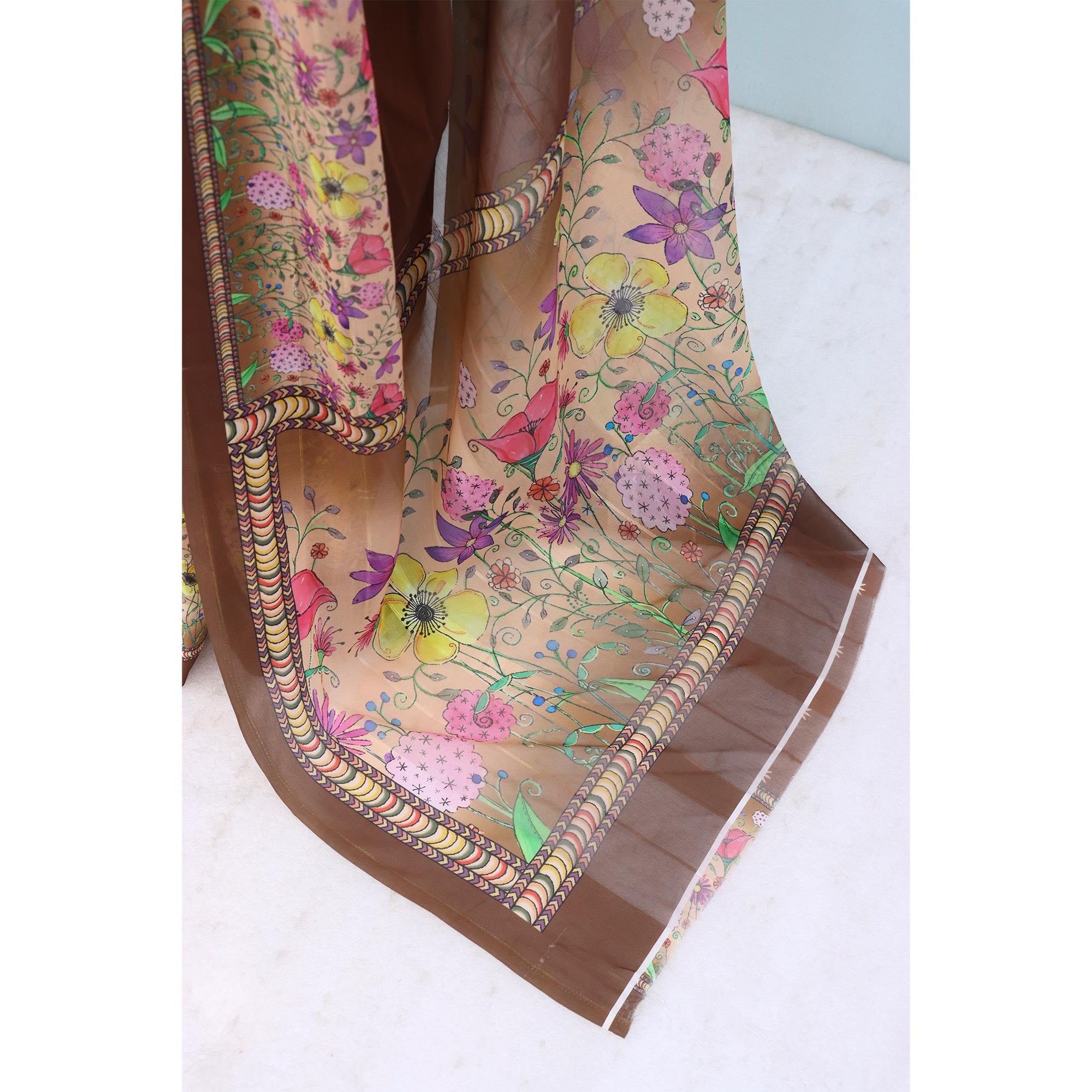 Charming Brown Floral Digital Printed Georgette Saree Accentuated With Zari Stripes