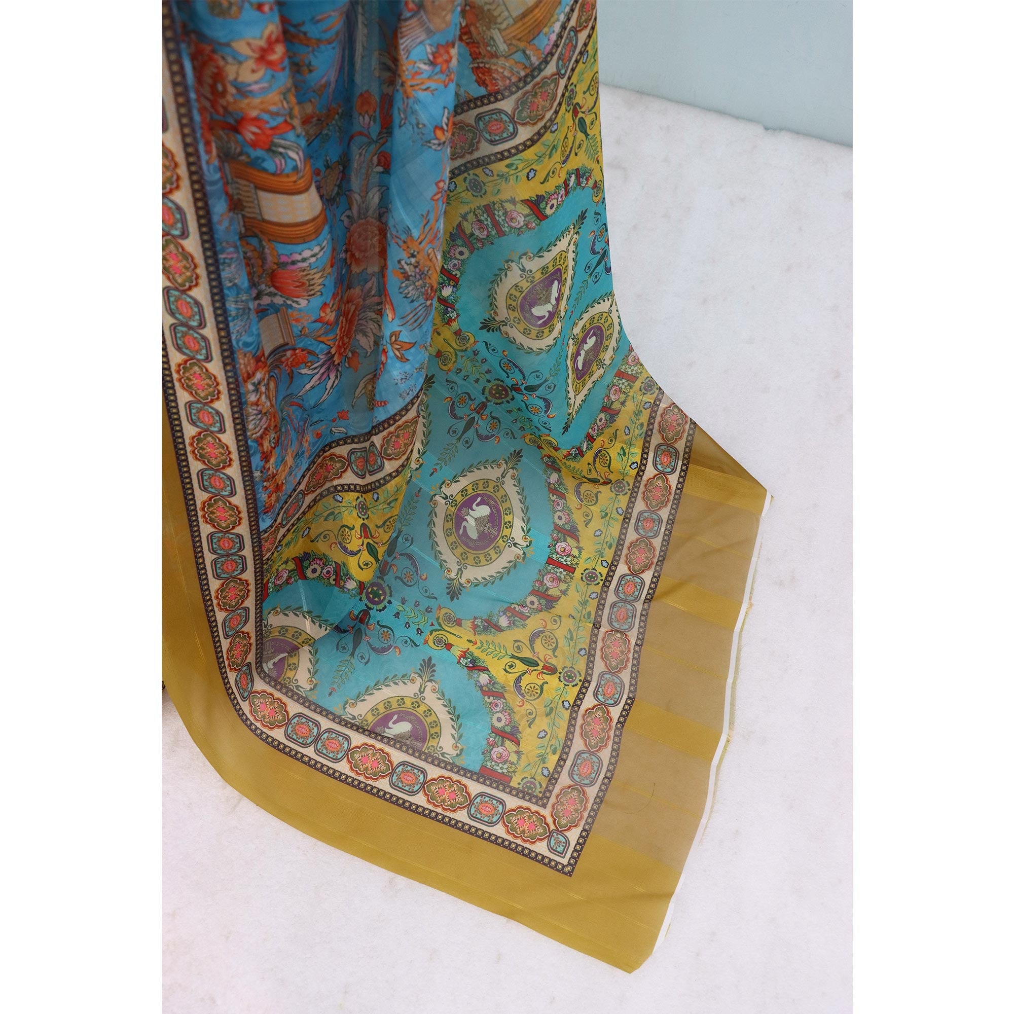 Charming Blue & Mehendi Floral Digital Printed Georgette Saree Accentuated With Zari Stripes