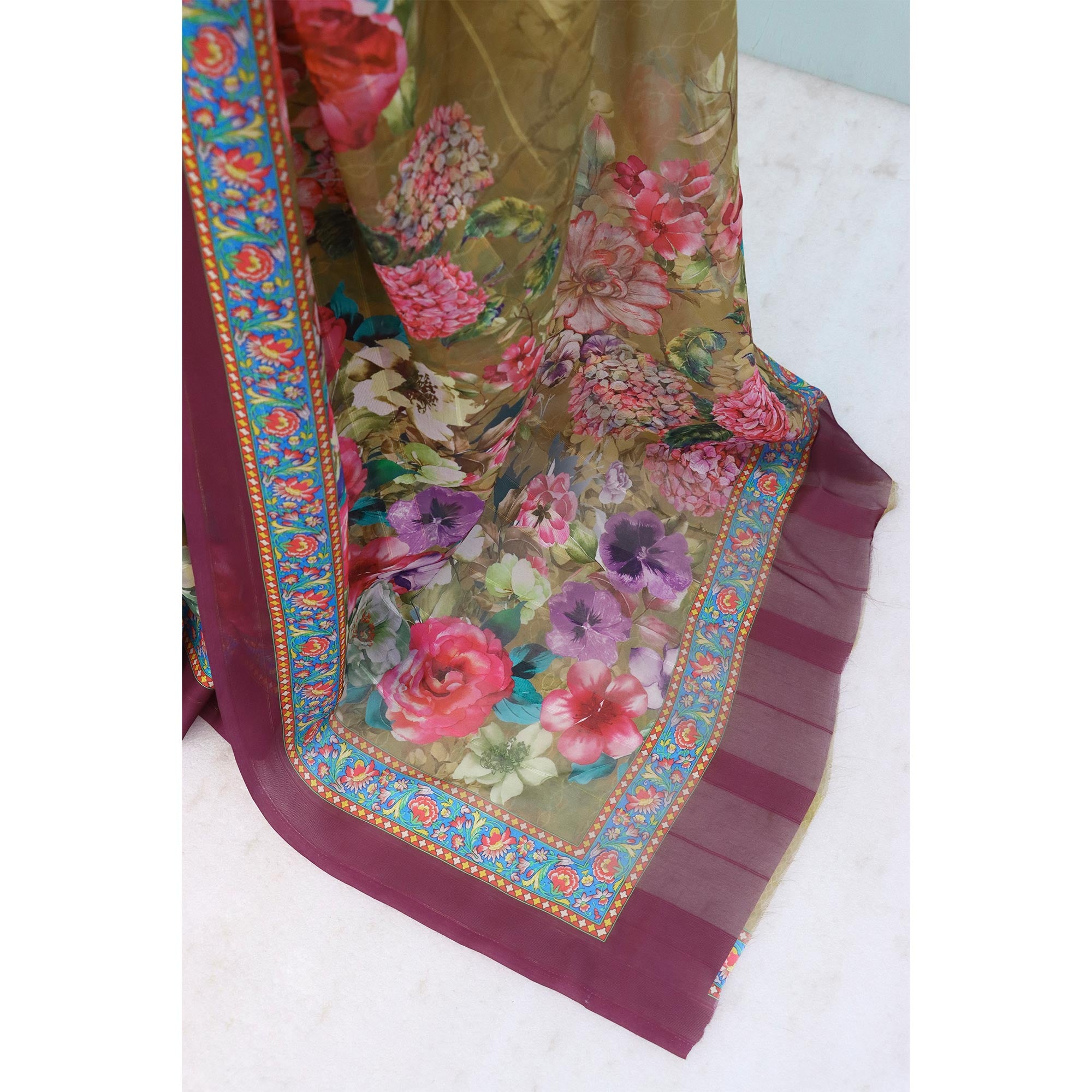 Charming Mehendi & Green Floral Digital Printed Georgette Saree Accentuated With Zari Stripes