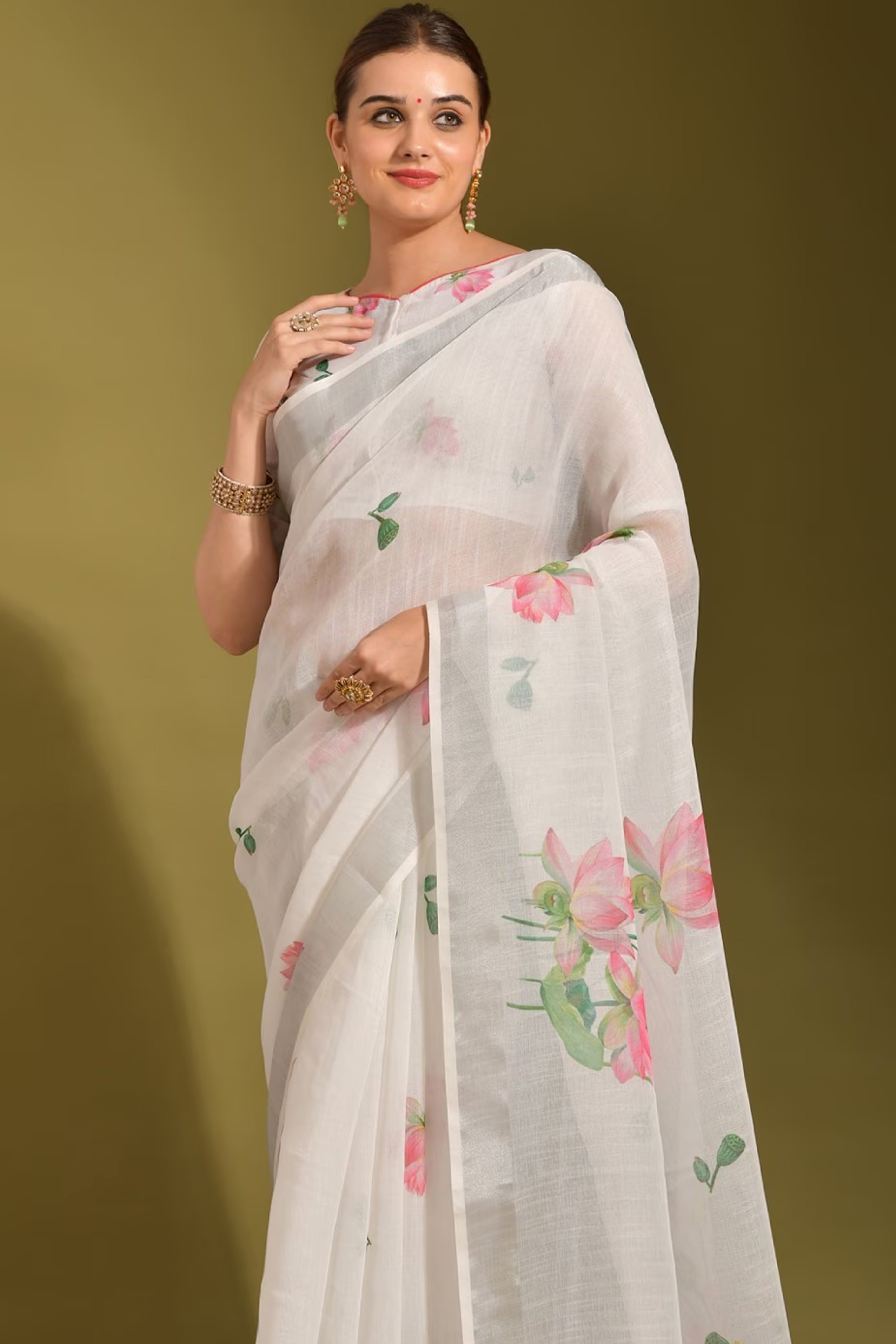 Ethereal White Linen Saree with Floral Print & Tassel Detail