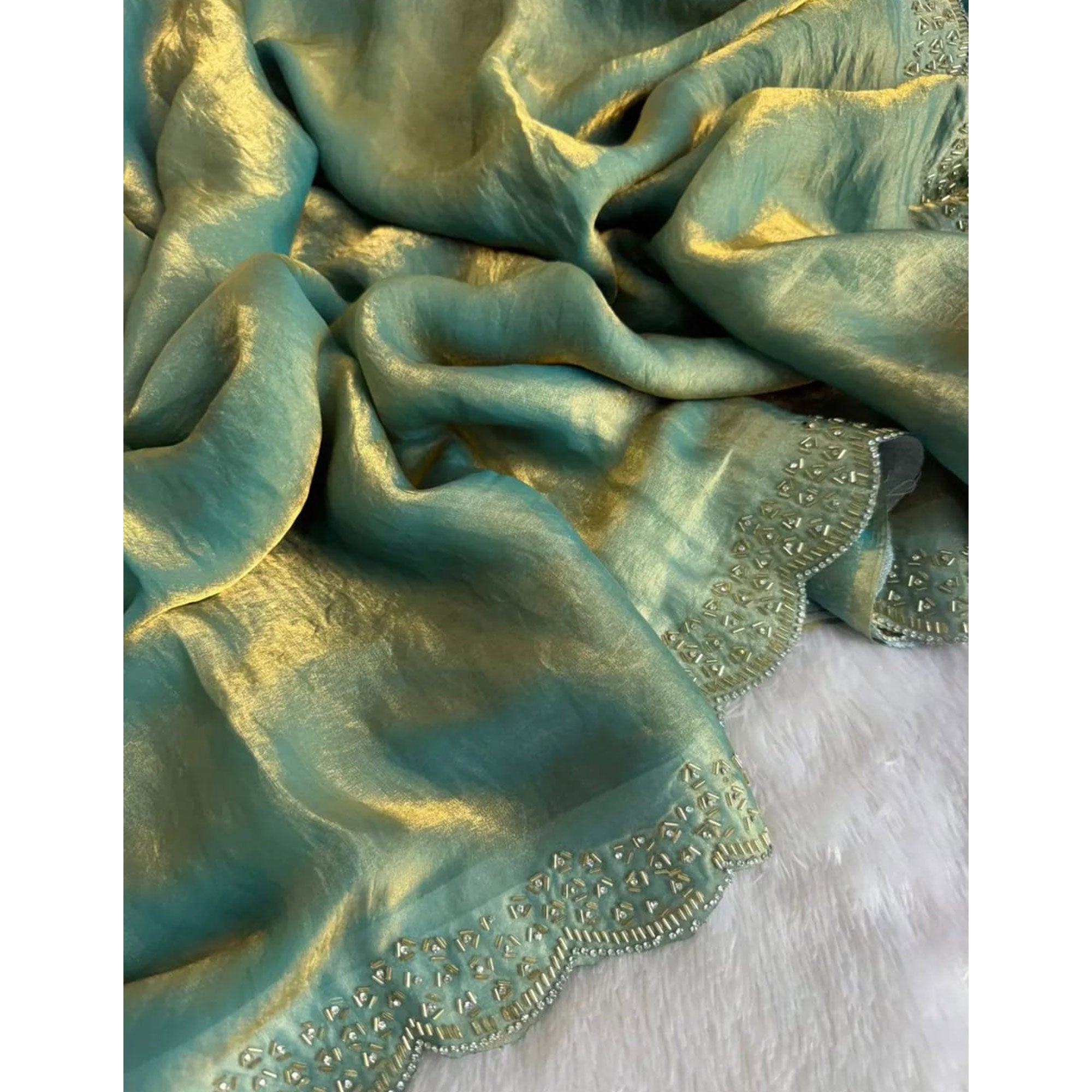 Elegant Sea Green Satin Saree Embellished in Gold Shine