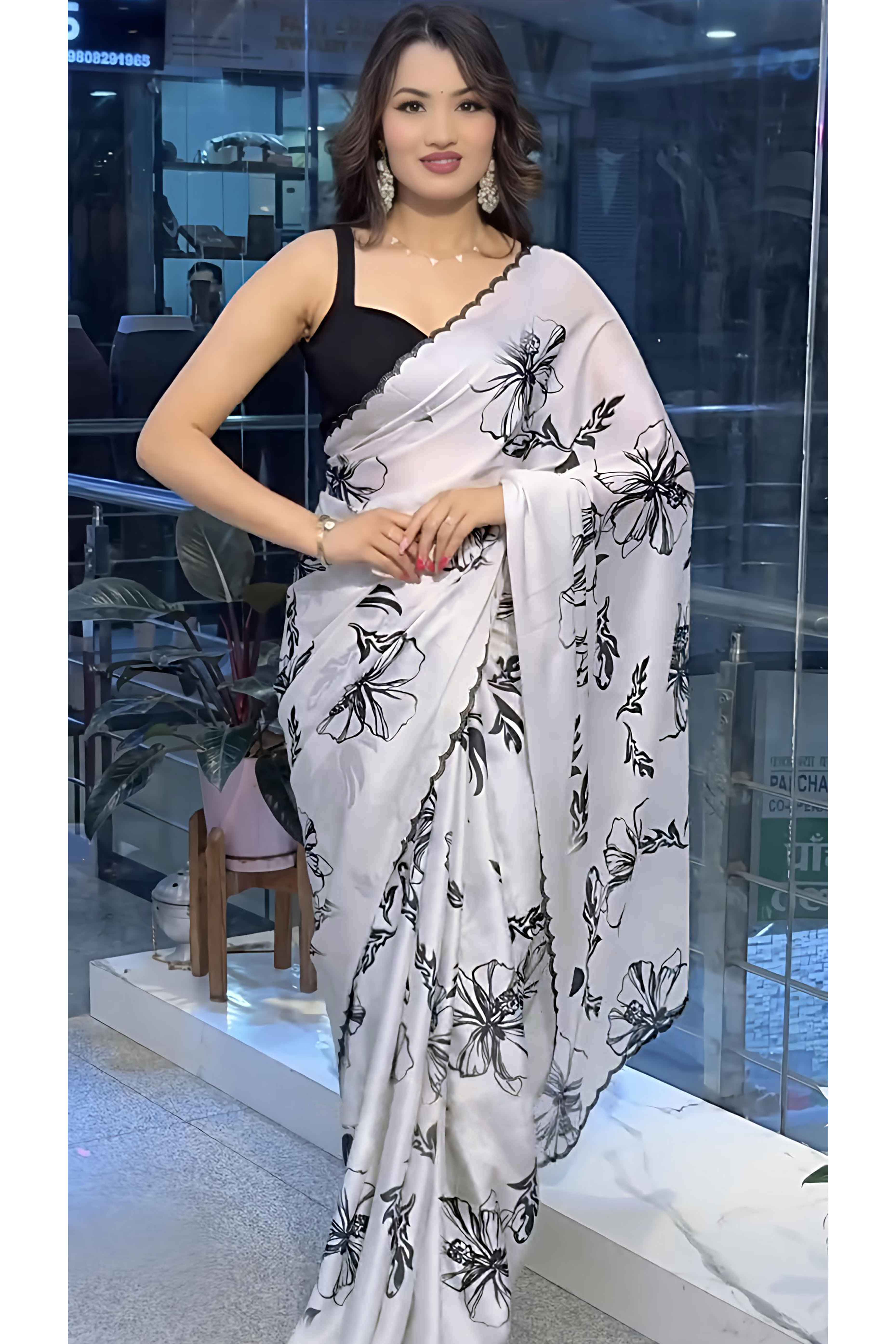 White Partywear Saree with Vibrant Floral Designs in Carbon Crepe