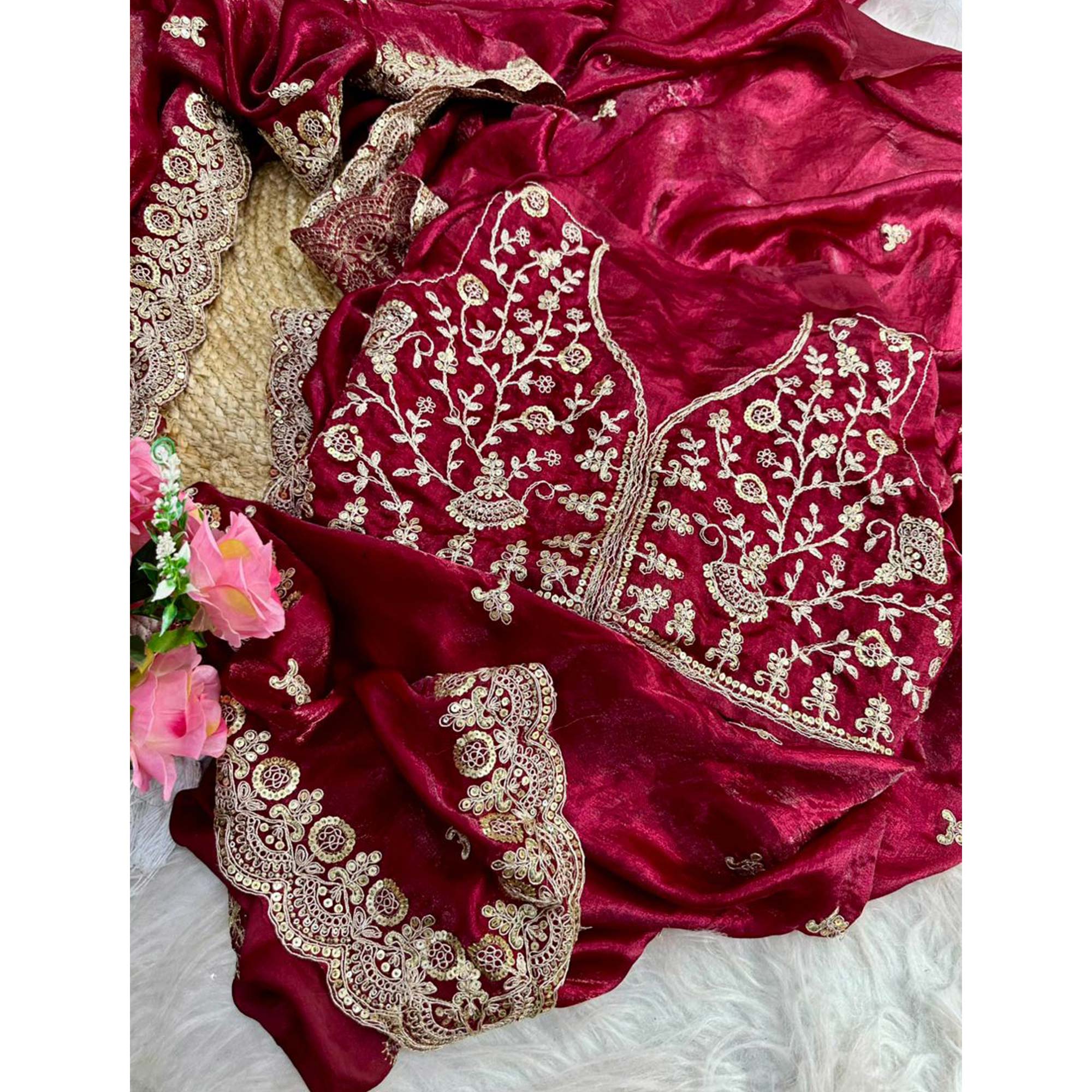 Trendy Maroon Fancy Satin Saree Enhanced with Rich Golden Embroidered Design