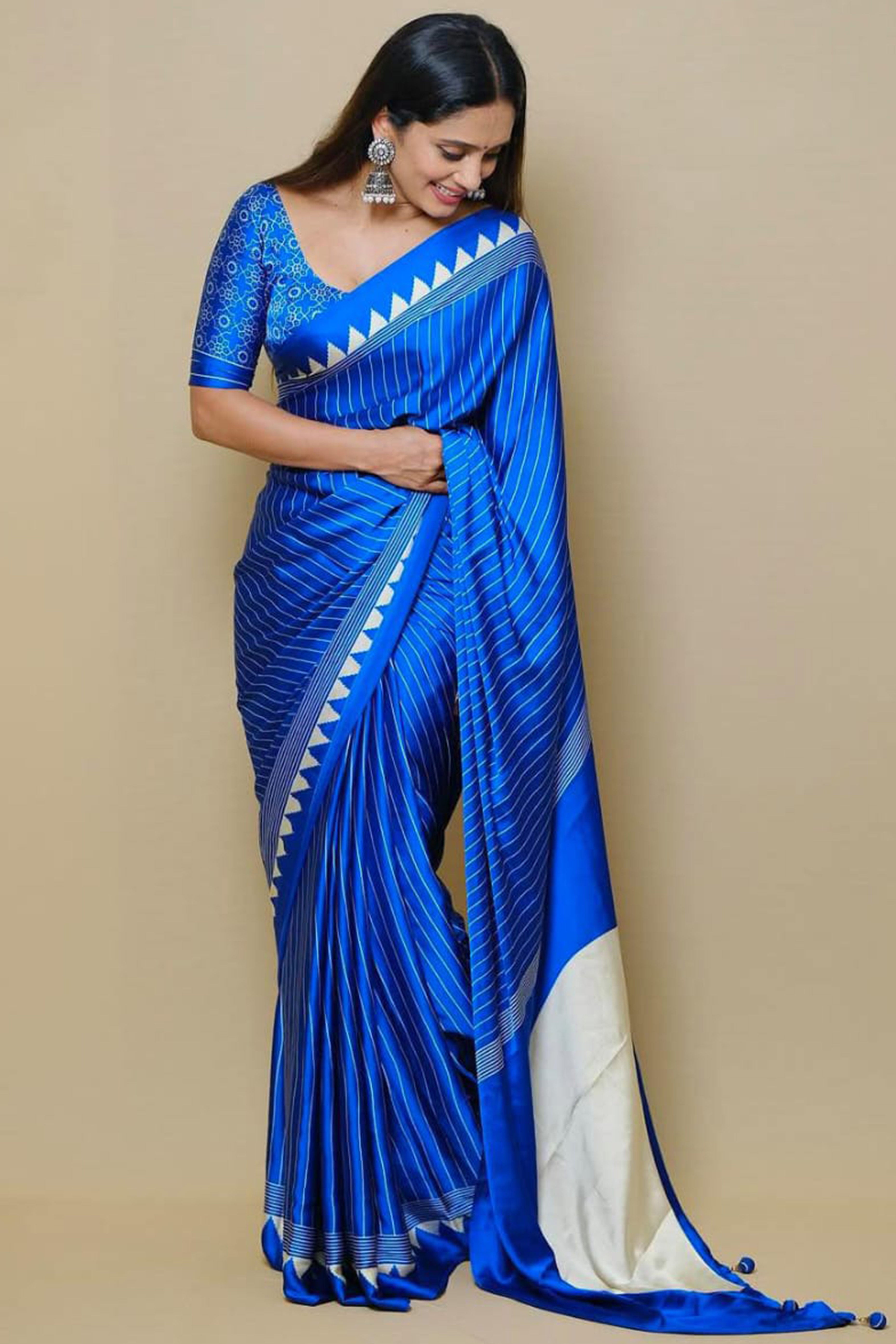 Blue Crepe Saree with Bold Striped Print and Smooth Finish for Partywear