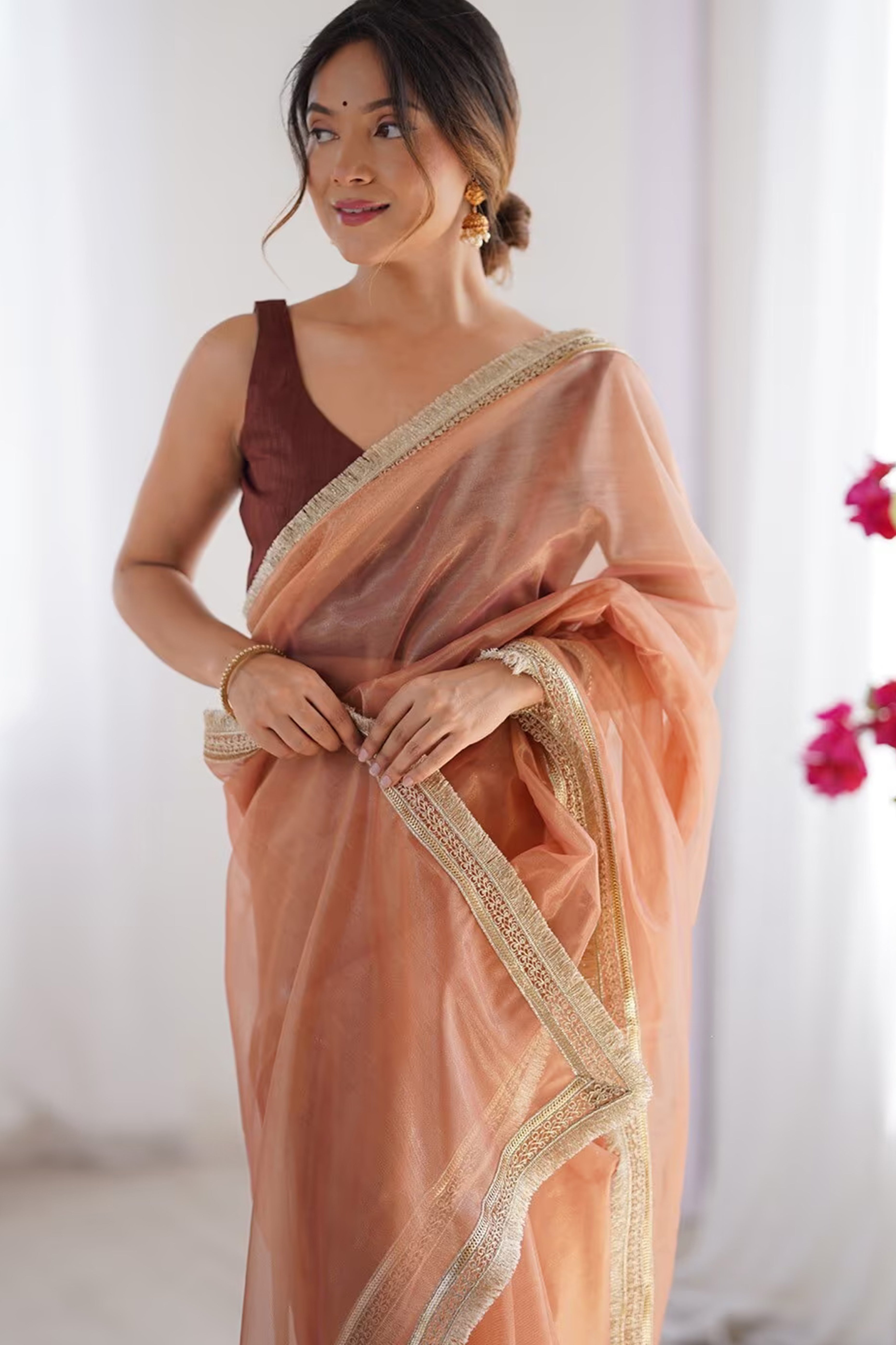 Brown Solid Pattern Net Saree with Refined Lace Work for Parties