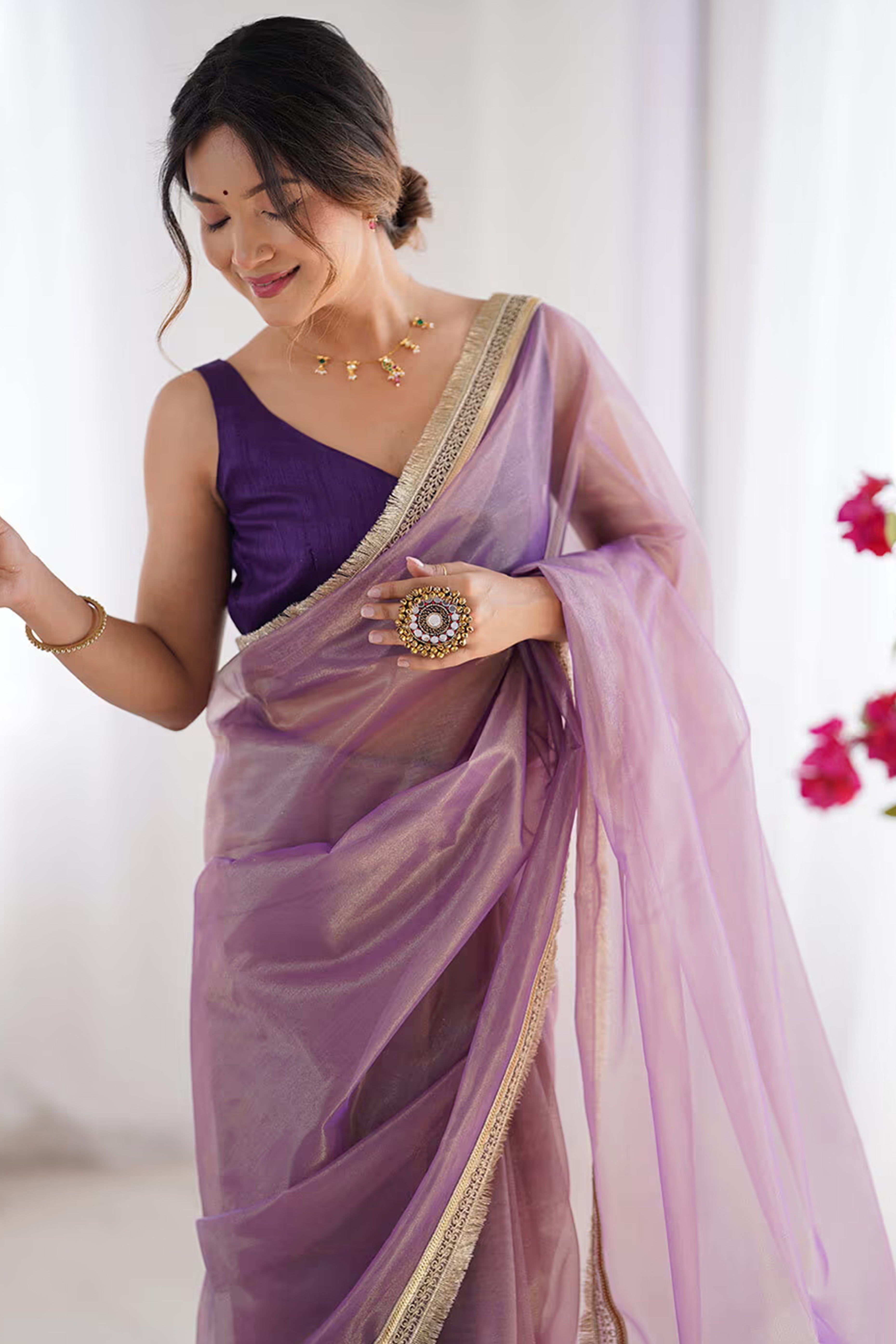 Purple Solid Pattern Net Saree with Refined Lace Work for Parties
