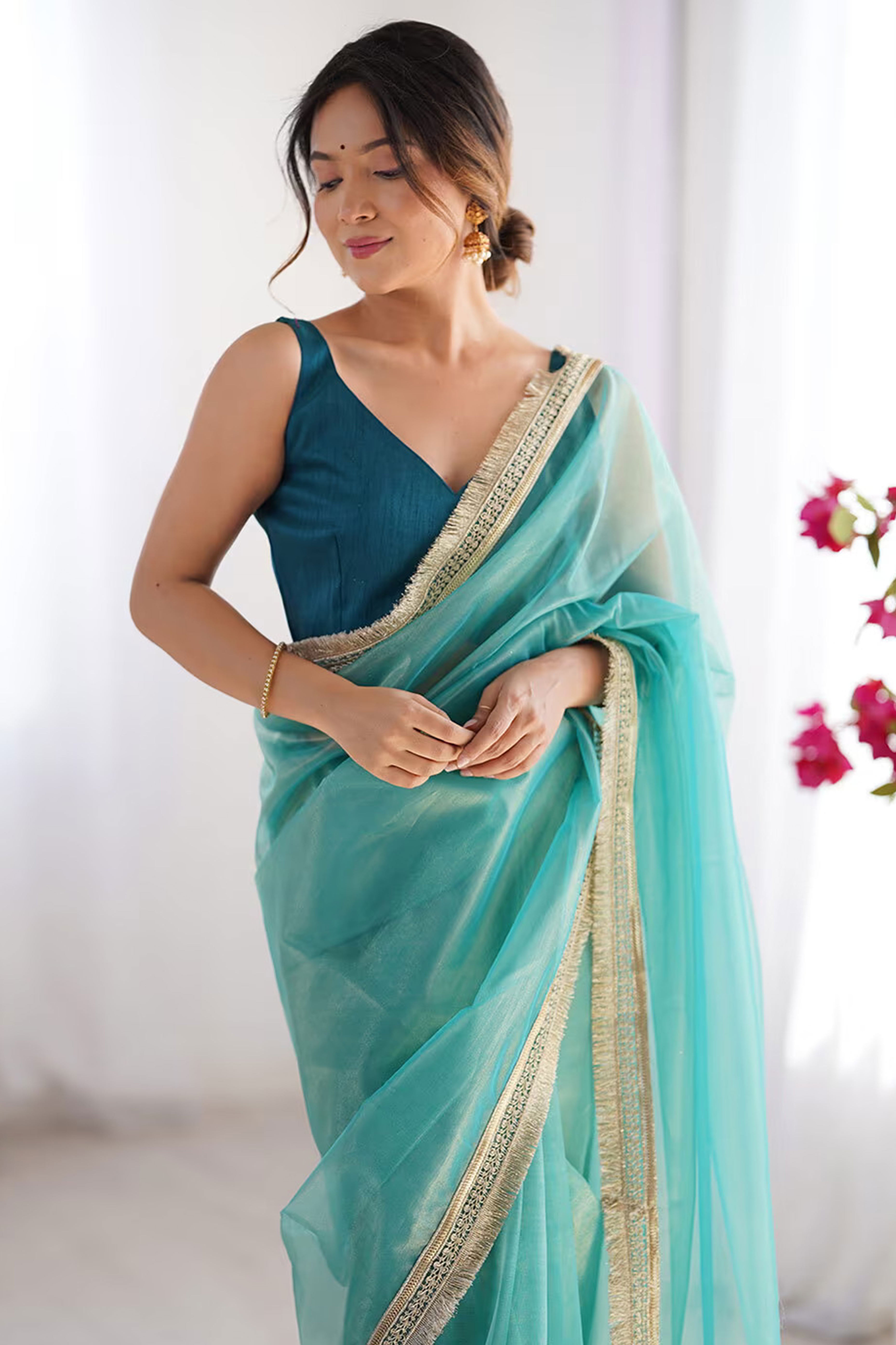 Turquoise Solid Pattern Net Saree with Refined Lace Work for Parties