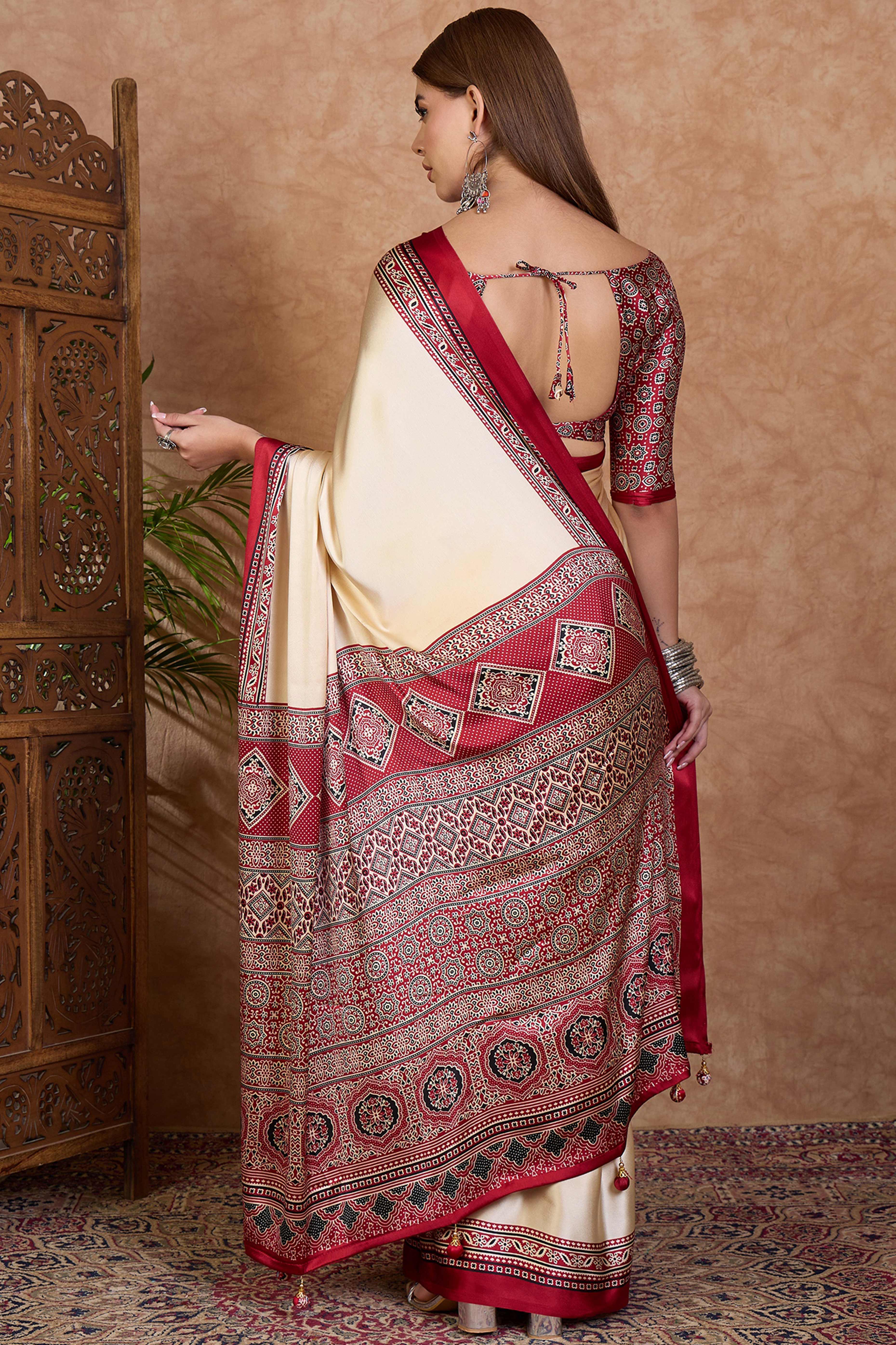 Cream & Red Modal Satin Saree Featuring a Solid Base and Artisanal Ajrakh Pallu