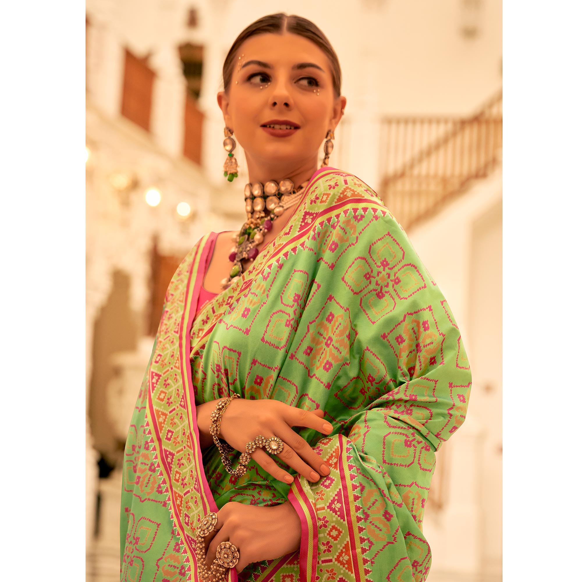 Green Patola Printed Banarasi Silk Saree With Tassels