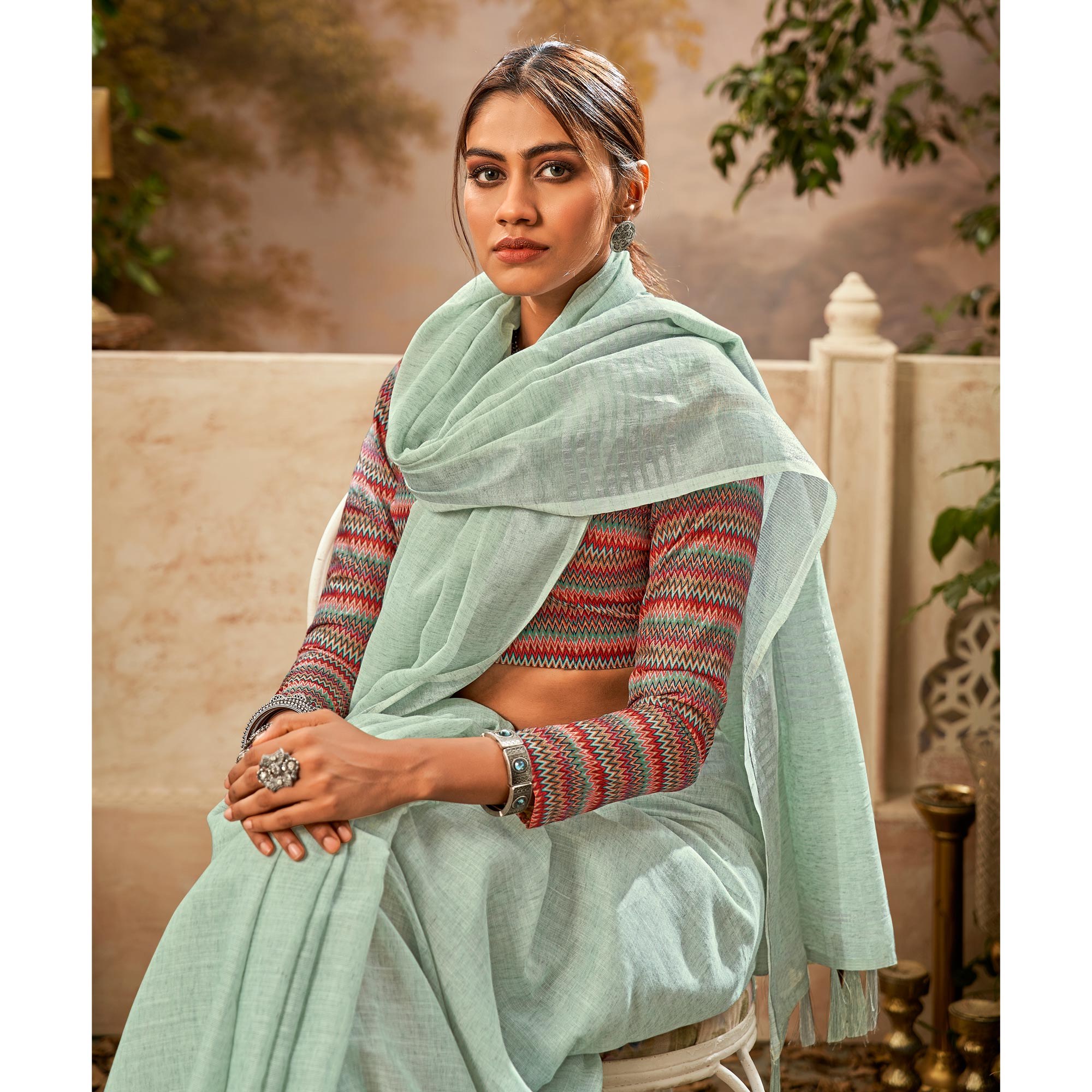 Pistachio green Linen Cotton Saree with unique thread buttas on its body,  pallu of strip designs