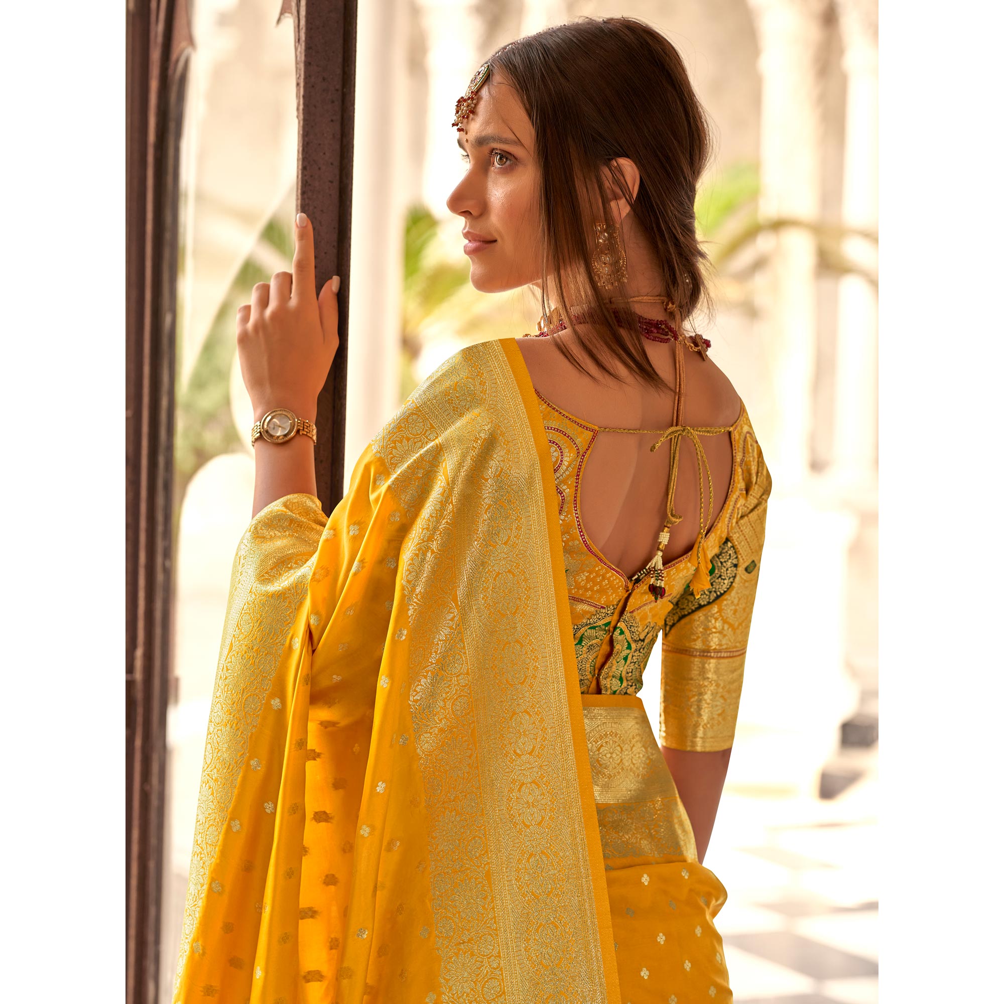 Yellow Floral Woven Banarasi Silk Saree With Tassels