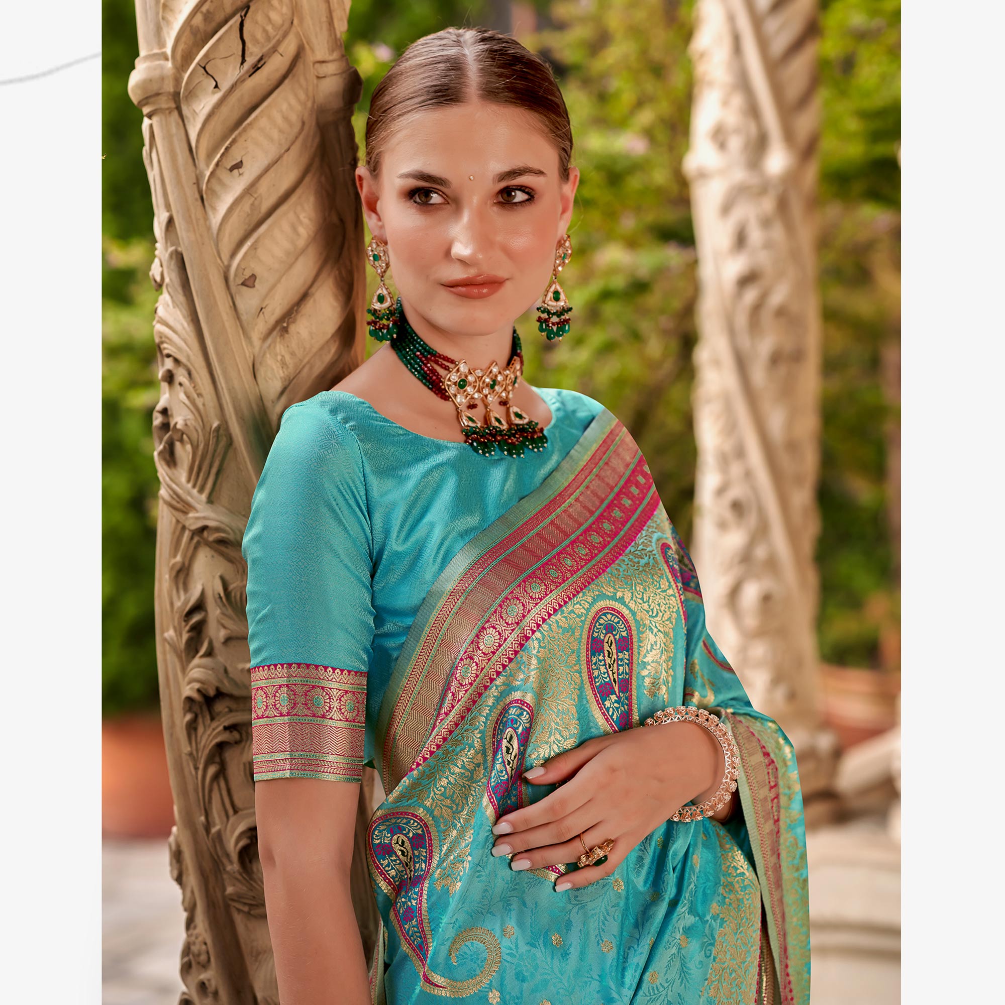 Turquoise Floral Woven Banarasi Silk Saree With Tassels