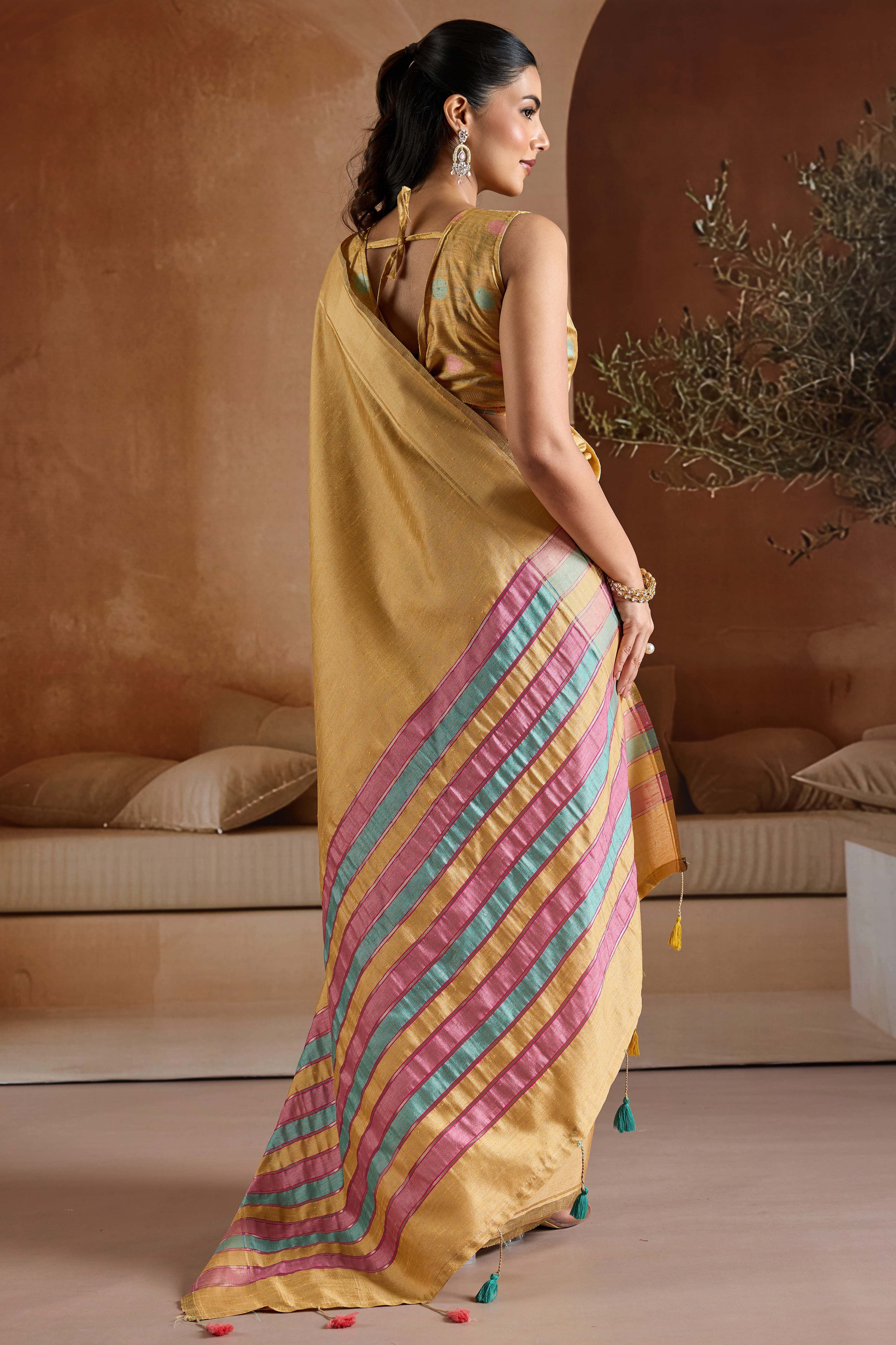 Graceful Chikoo Zari Woven Bhagalpuri Silk Saree Accented With Tassel Pallu